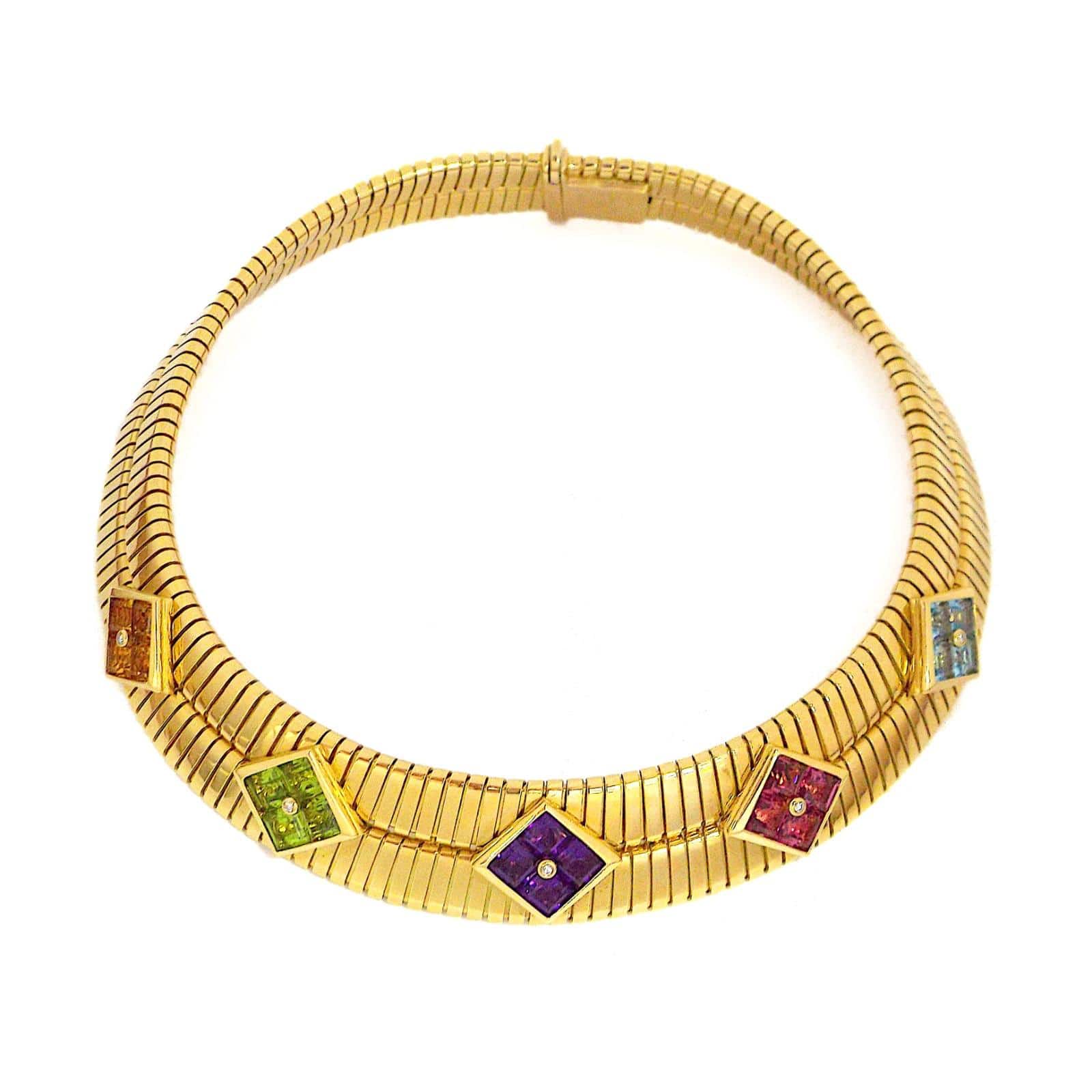 Bulgari Bulgari Solid Gold tubogas, 188gr set with amethyst, blu etopaz, peridot, citrine and pink tourmaline  ASC5098