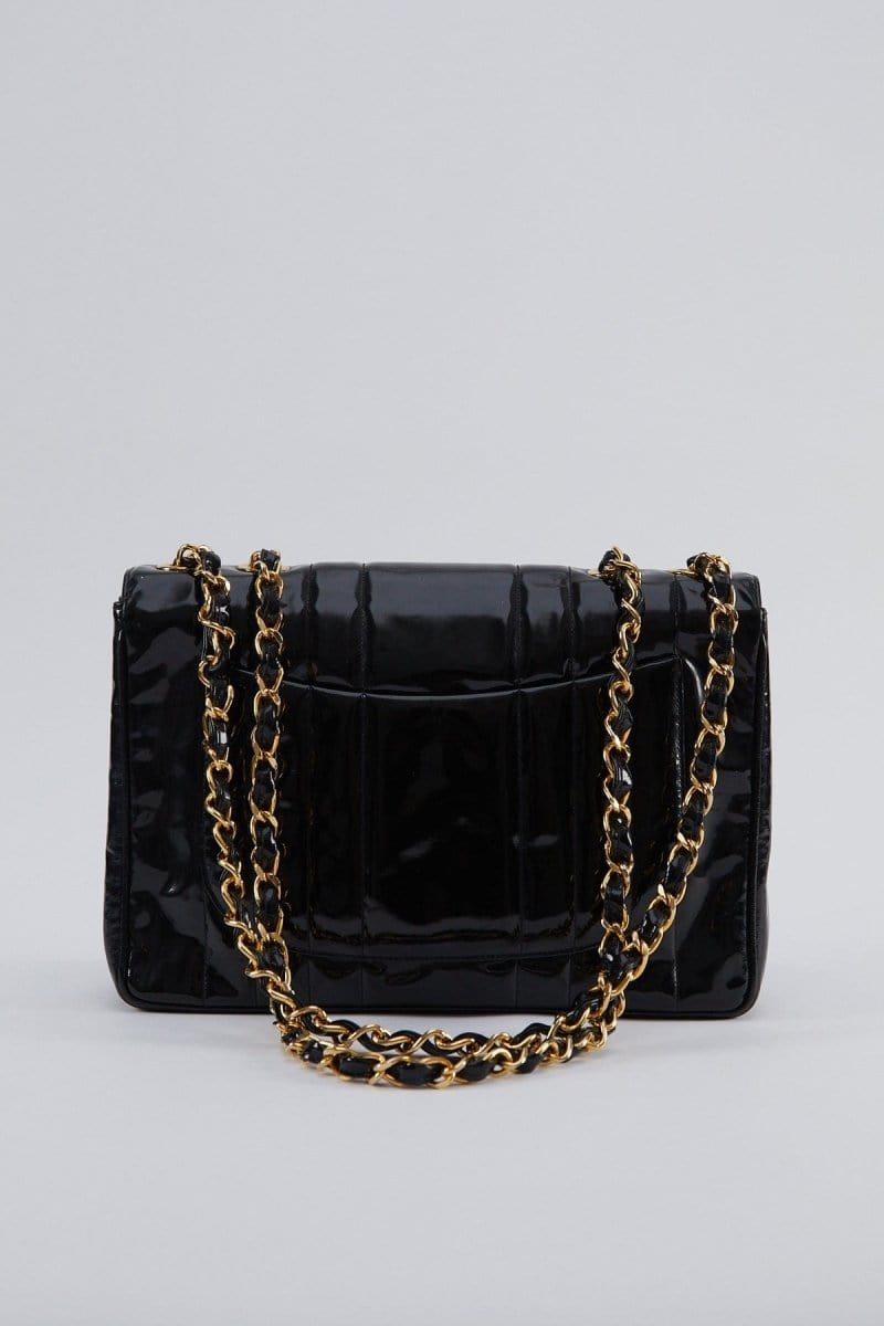 17. LP X C Chanel mademoiselle jumbo patent black flap