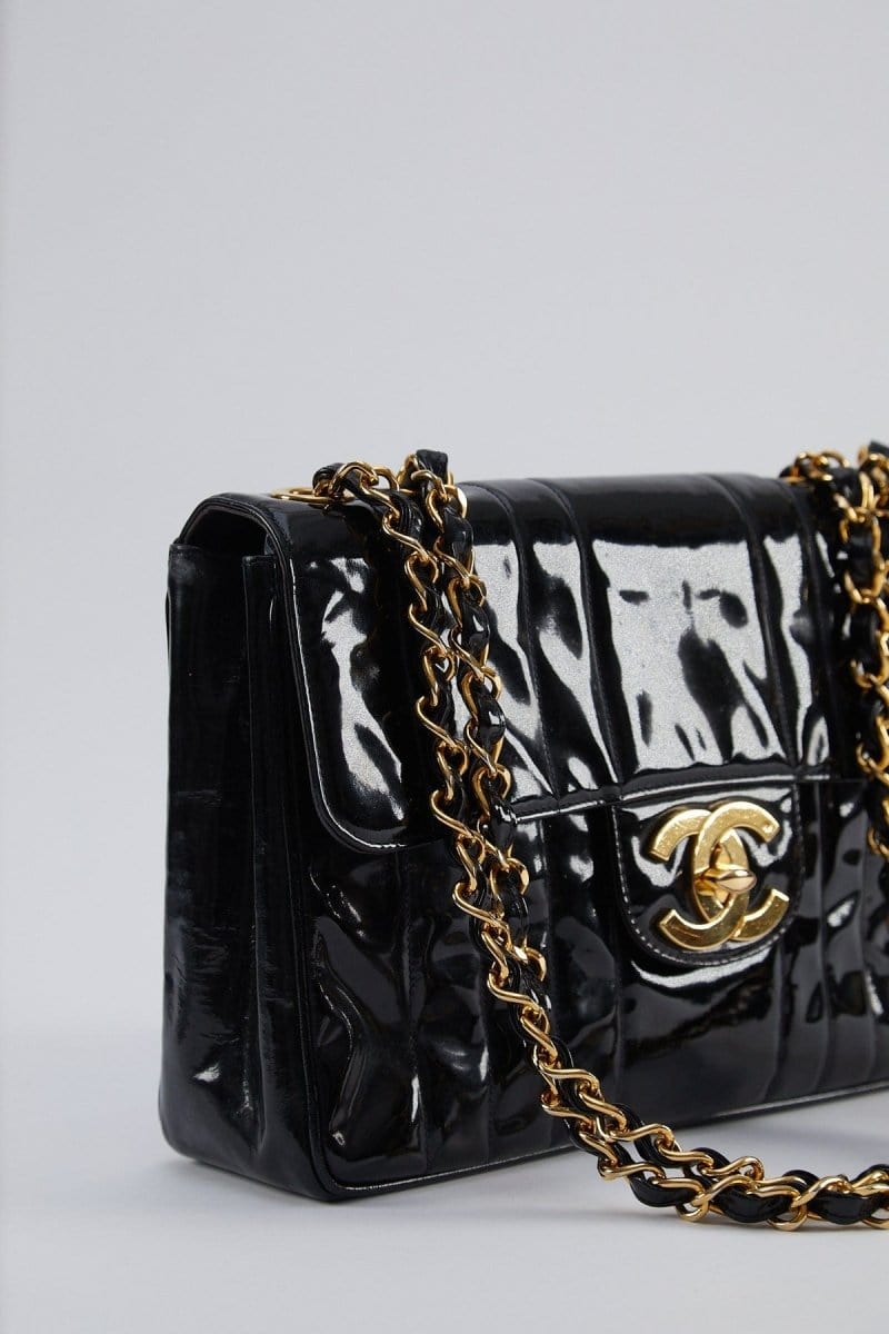 17. LP X C Chanel mademoiselle jumbo patent black flap