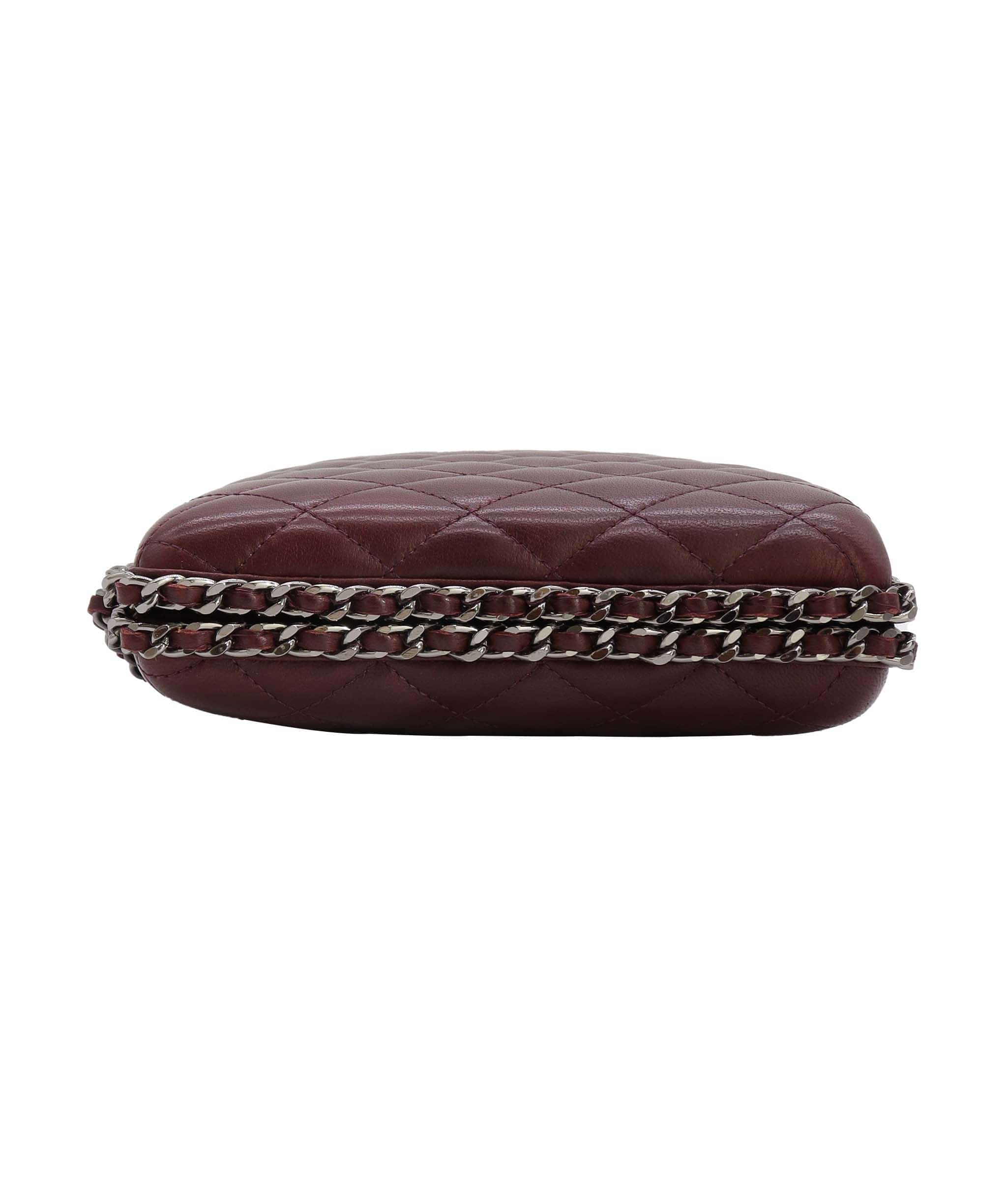 Chanel Chanel burgundy quilted clutch with crossbody strap