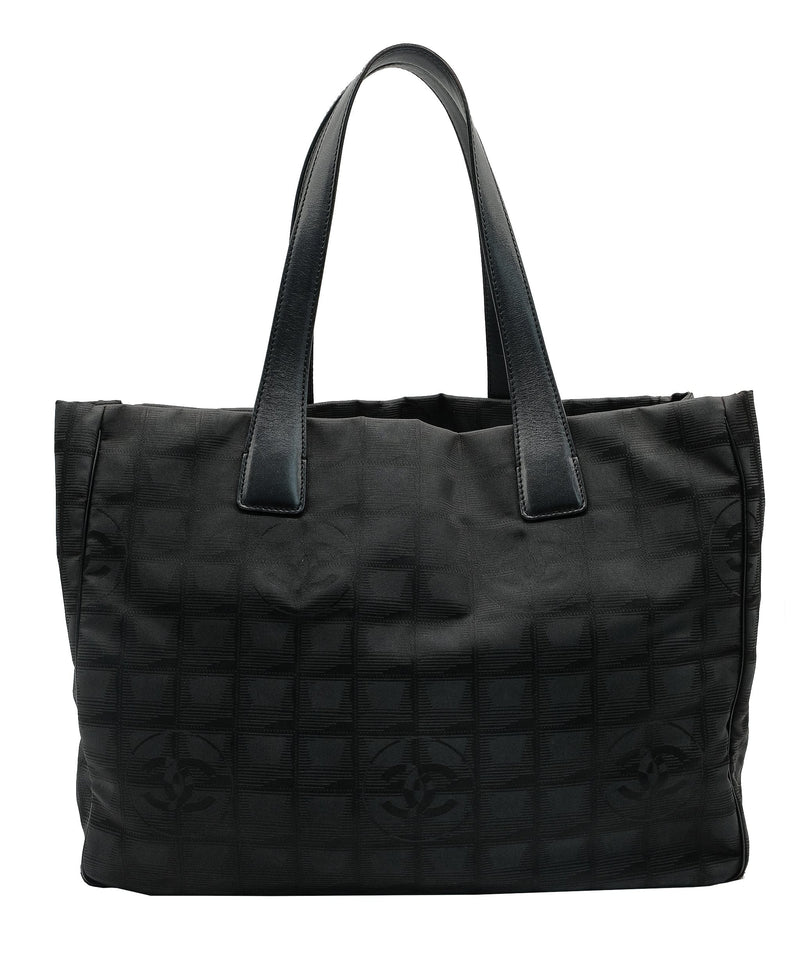 Chanel travel hotsell ligne tote