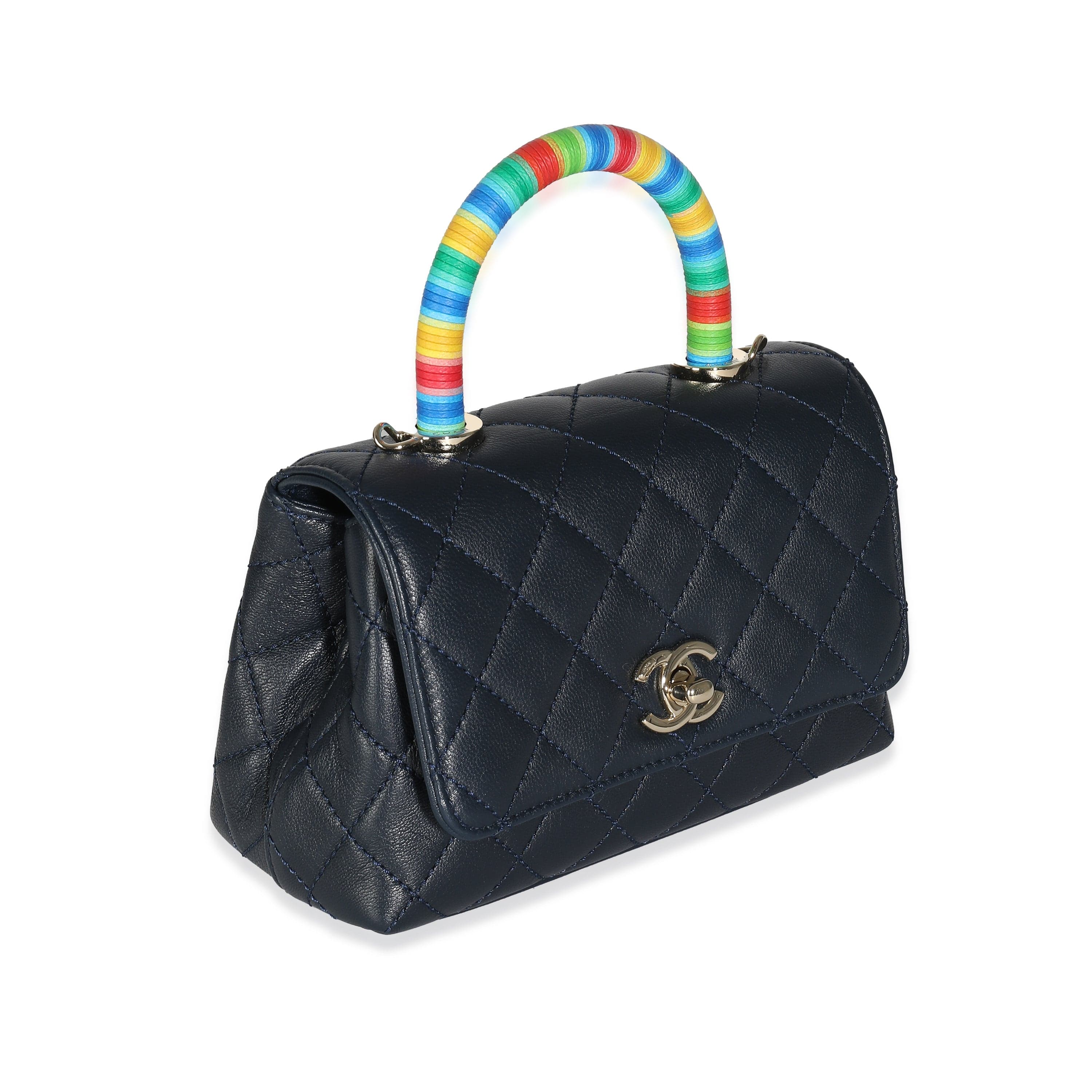 Chanel Navy Quilted Goatskin Rainbow Extra Mini Coco Top Handle Bag –  LuxuryPromise