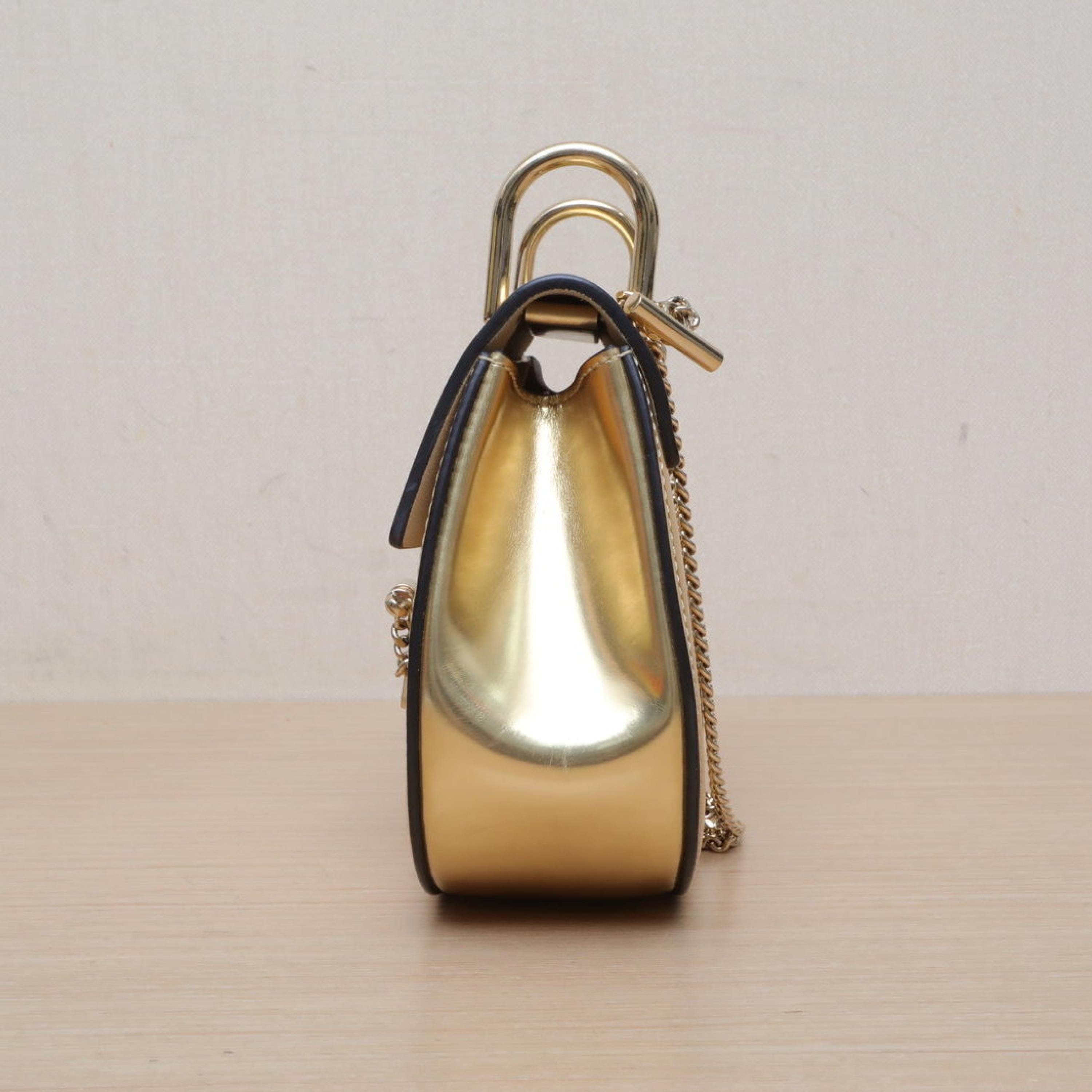 Chloé Chloe Drew Piggy Bank Small Gold Leather C
No accessories ALC3152