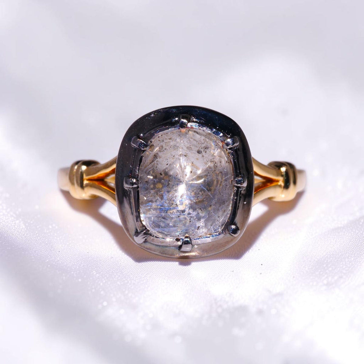 Gold solitaire ring set with a single uncut polki diamond