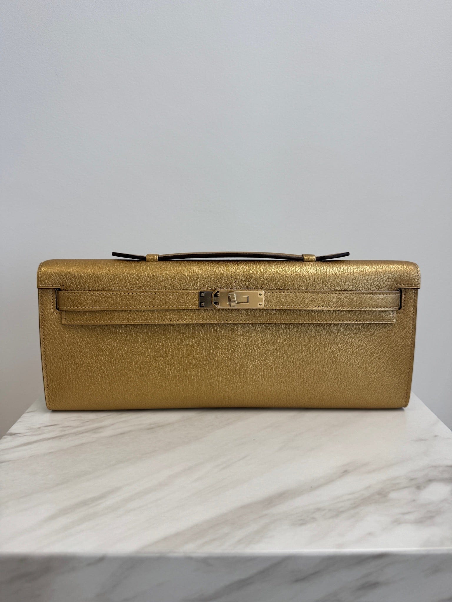 Hermès Hermès Kelly Cut Chamkilight Dore Chevre Permabrass Hardware