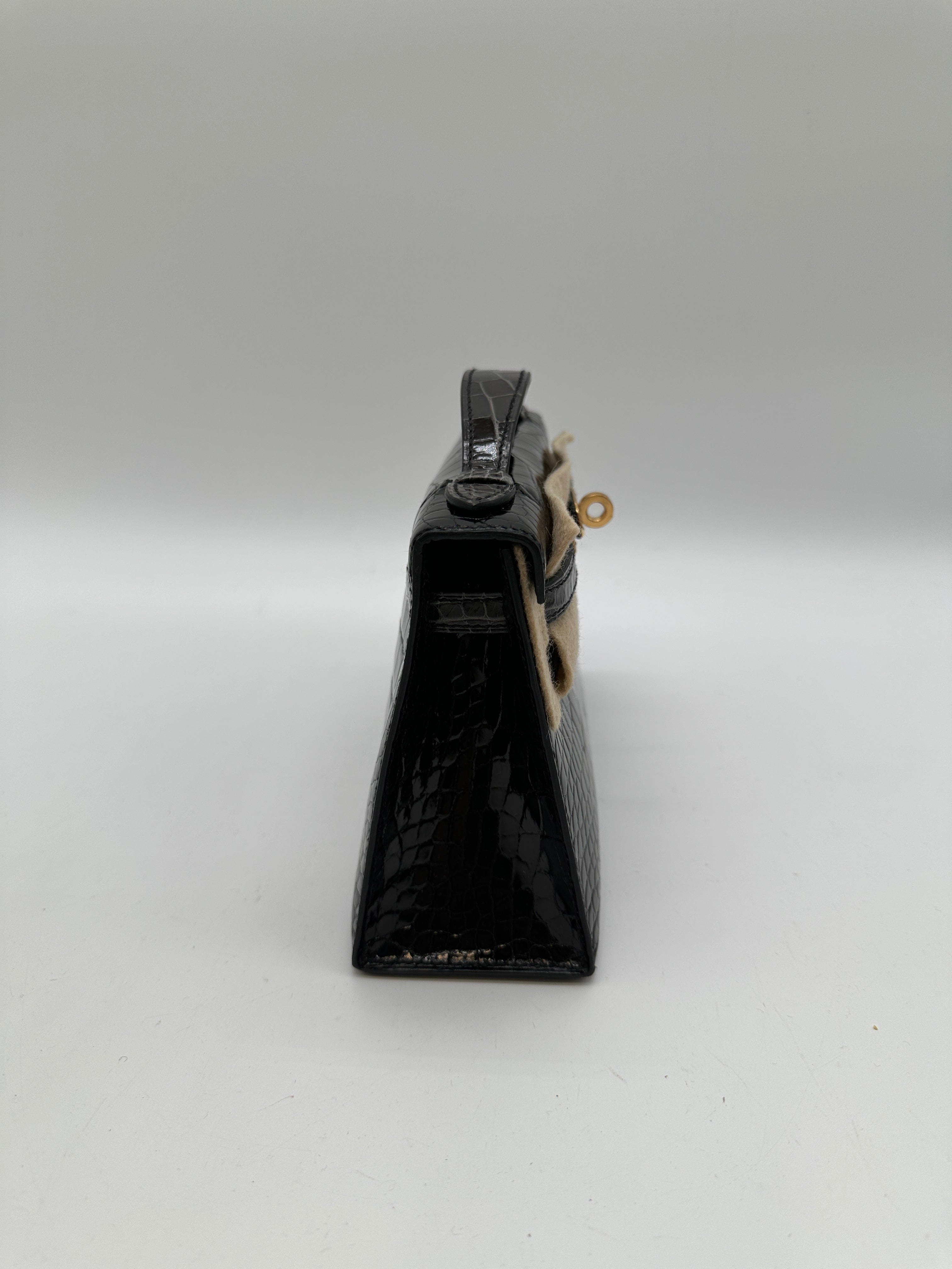 Hermès Hermès Kelly Pochette HSS black / graphite shiny alligator GHW W 2025 PC525