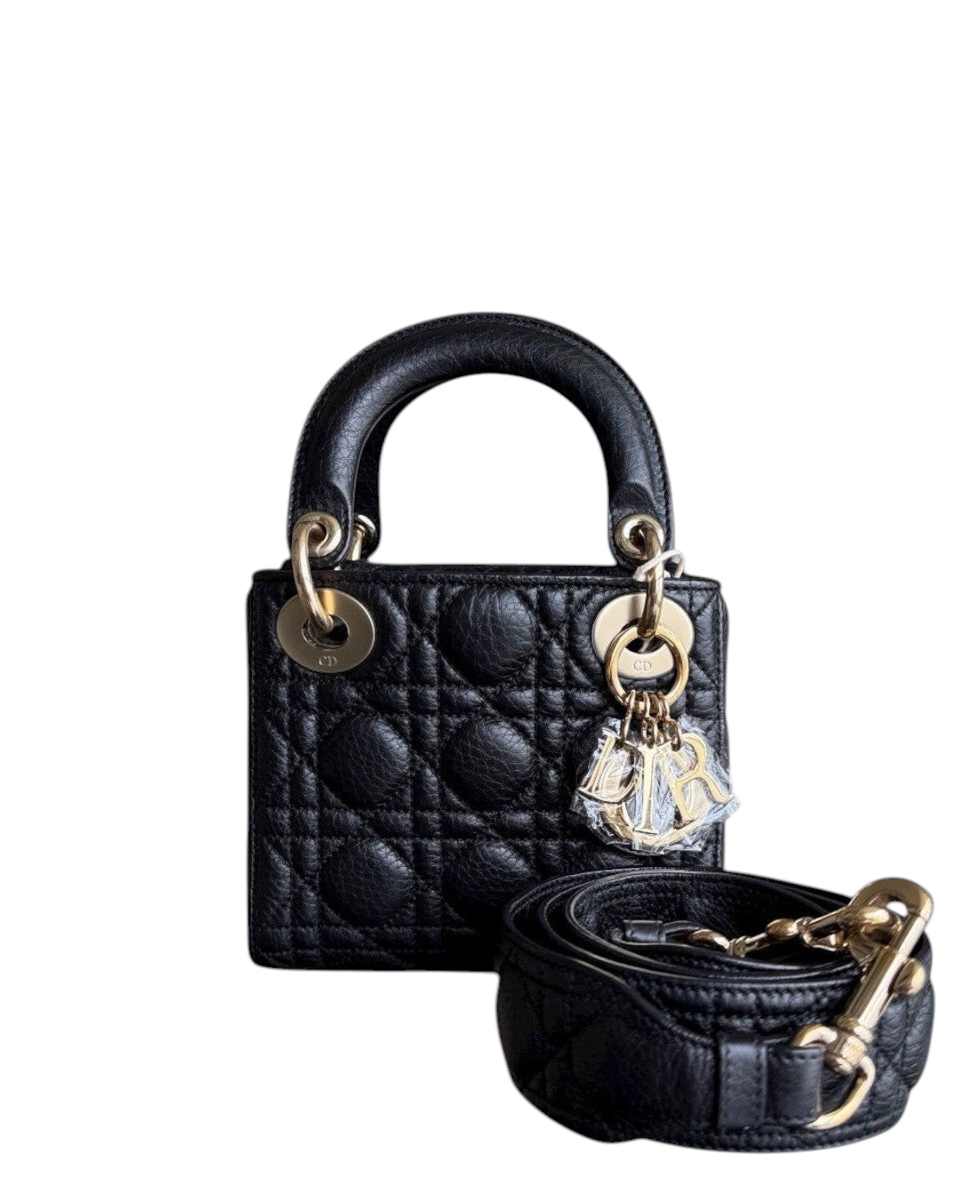 Luxury Evermore black grained calfskin Lady Dior mini bag with iconic cannage stitching and gold-tone hardware.
