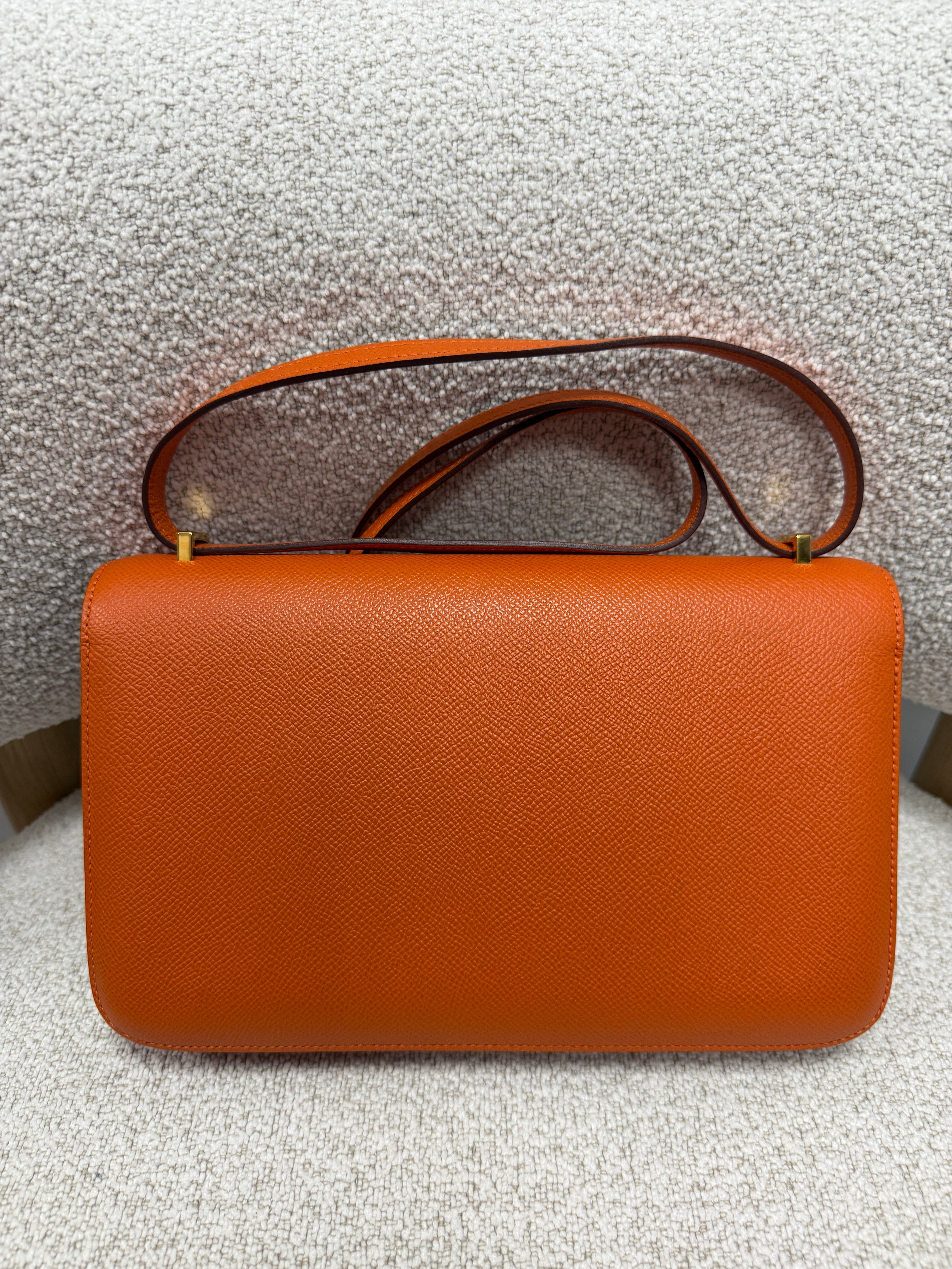 LUXURY PROMISE PRELOVED HERMÈS CONSTANCE ELAN ORANGE Epsom Leather with Gold Hardware