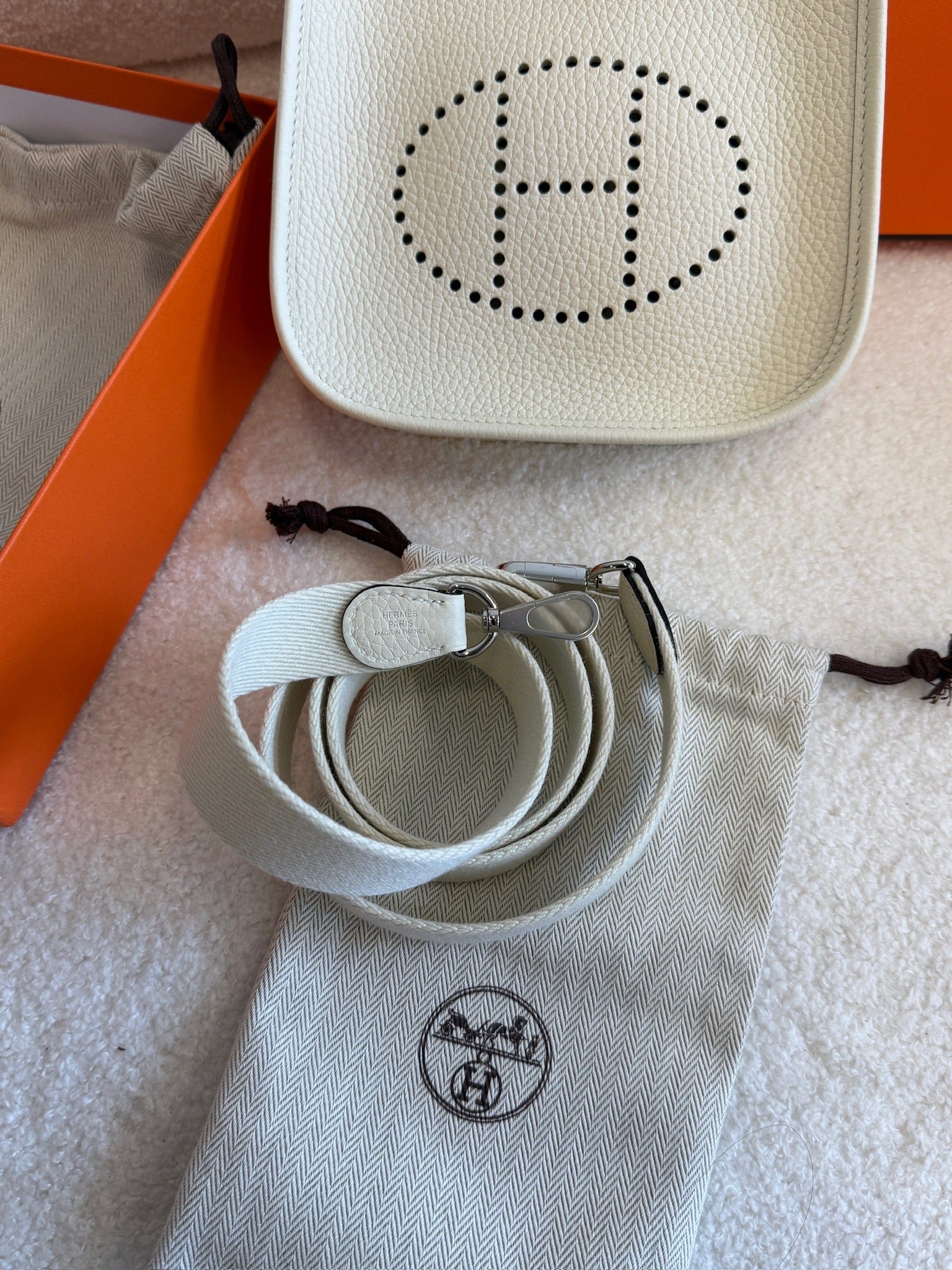 LUXURY PROMISE Hermès Evelyne Mini Crossbody Bag | Craie Togo Leather Perforated H Logo Shoulder Bag