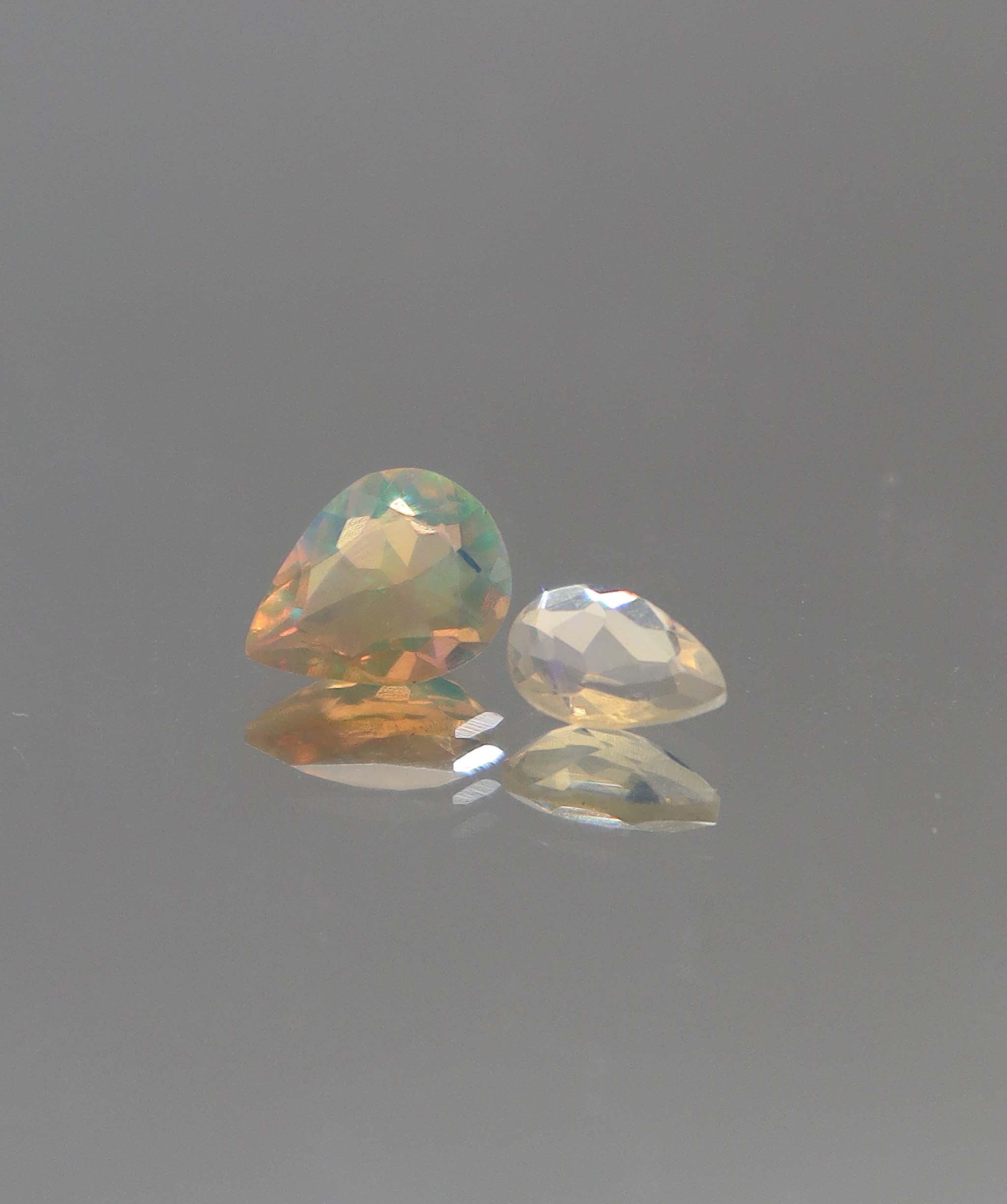 Luxury Promise 0.87ct Opal Pear pair DXBCS2293