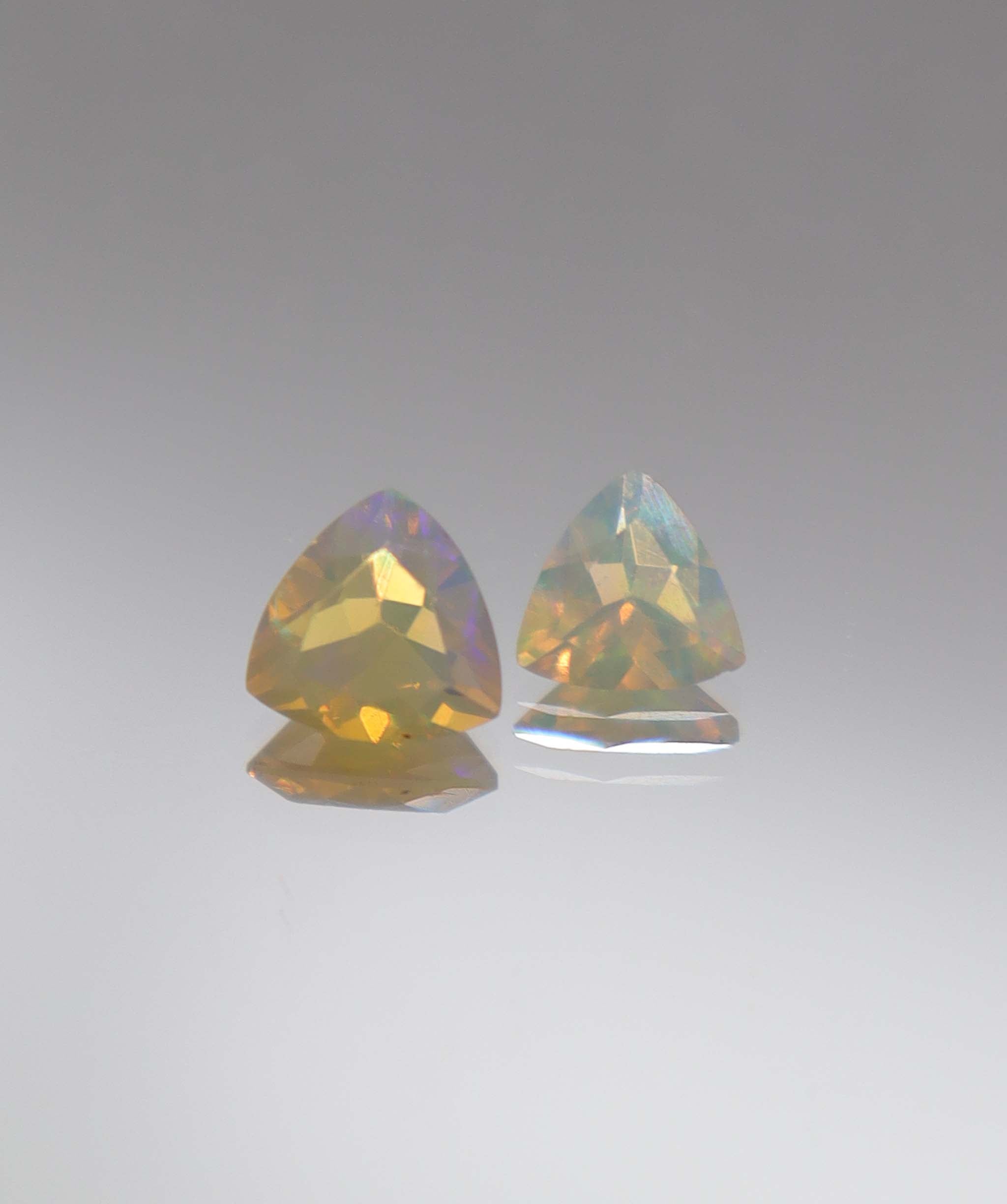Luxury Promise 0.93ct Opal Trillion pair DXBCS2292