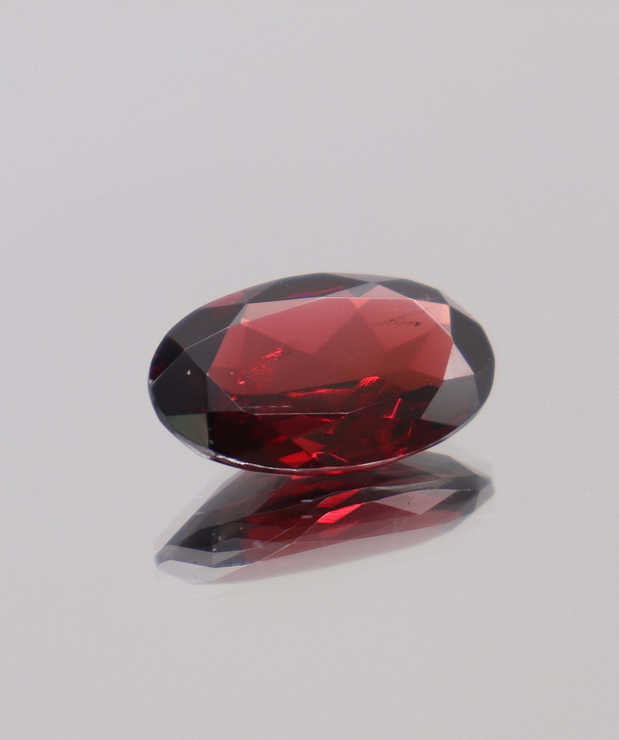 Luxury Promise 11.11ct Almandine Oval DXBCS0398