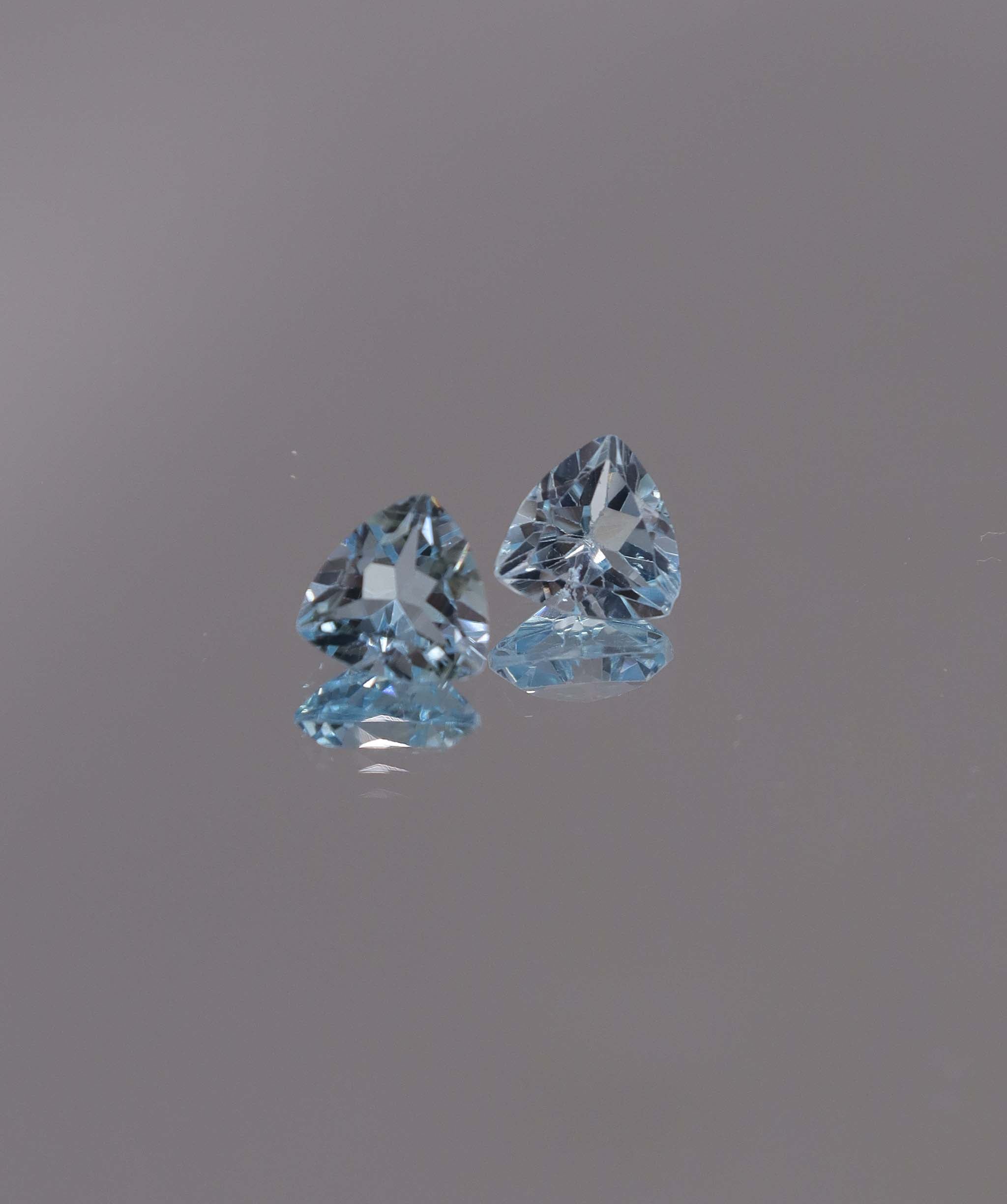 Luxury Promise 2.50ct Sky Blue Topaz Trillion pair DXBCS1217
