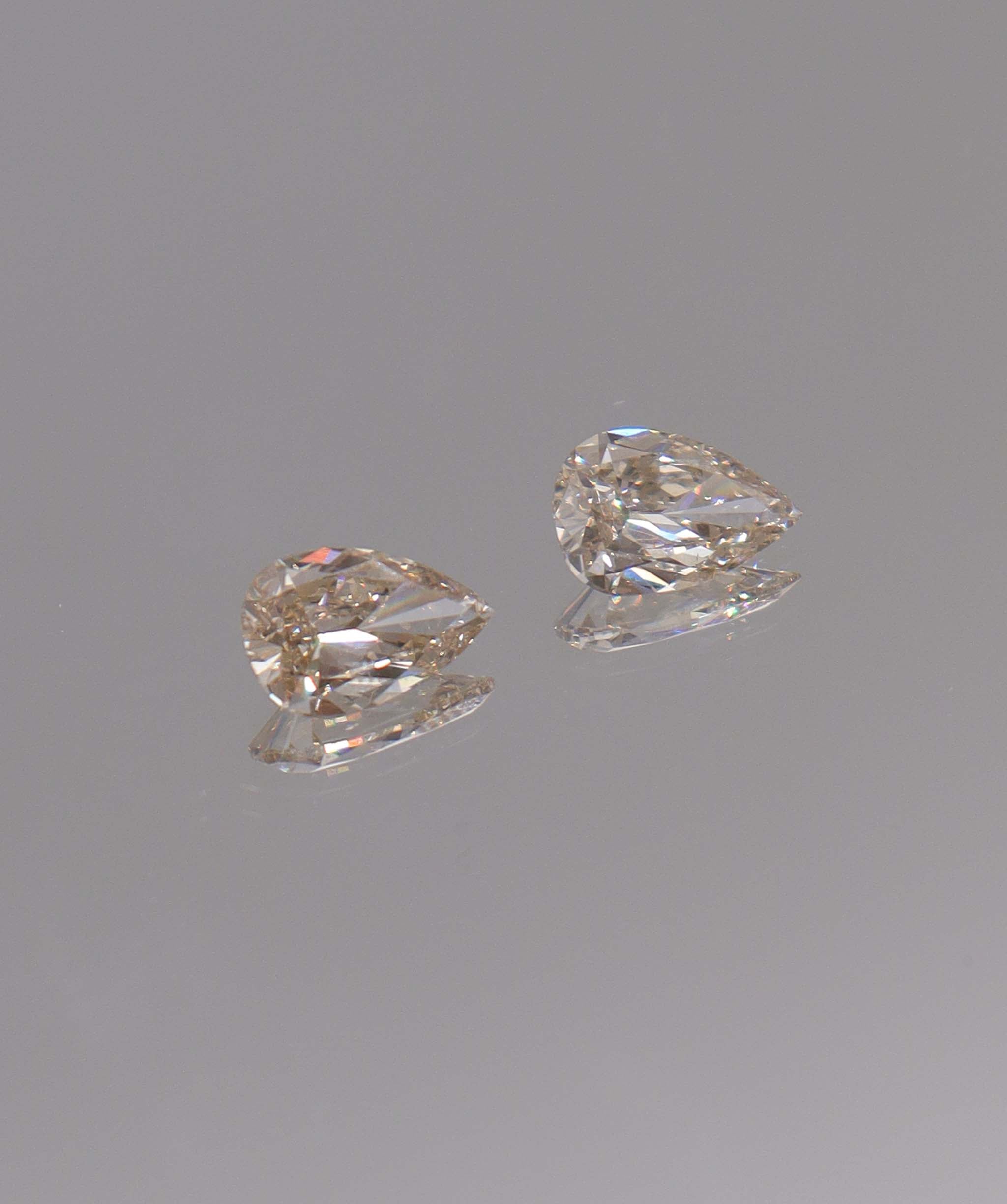 Luxury Promise 2.61CT ROSEFLAME PINK PEARSHAPE PAIR OF DIAMONDS DXBN0472