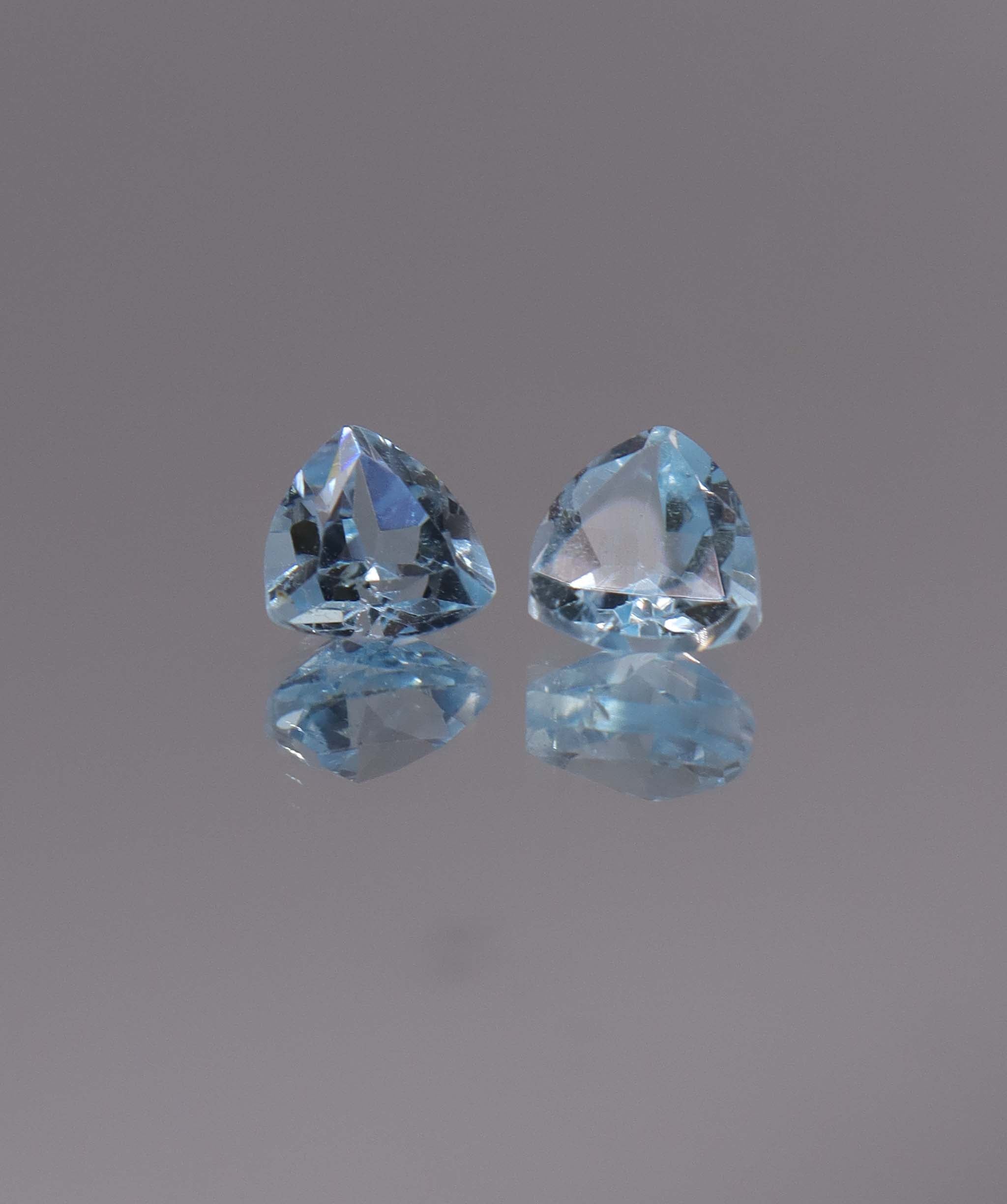 Luxury Promise 3.06ct Sky Blue Topaz Trillion pair DXBCS1212