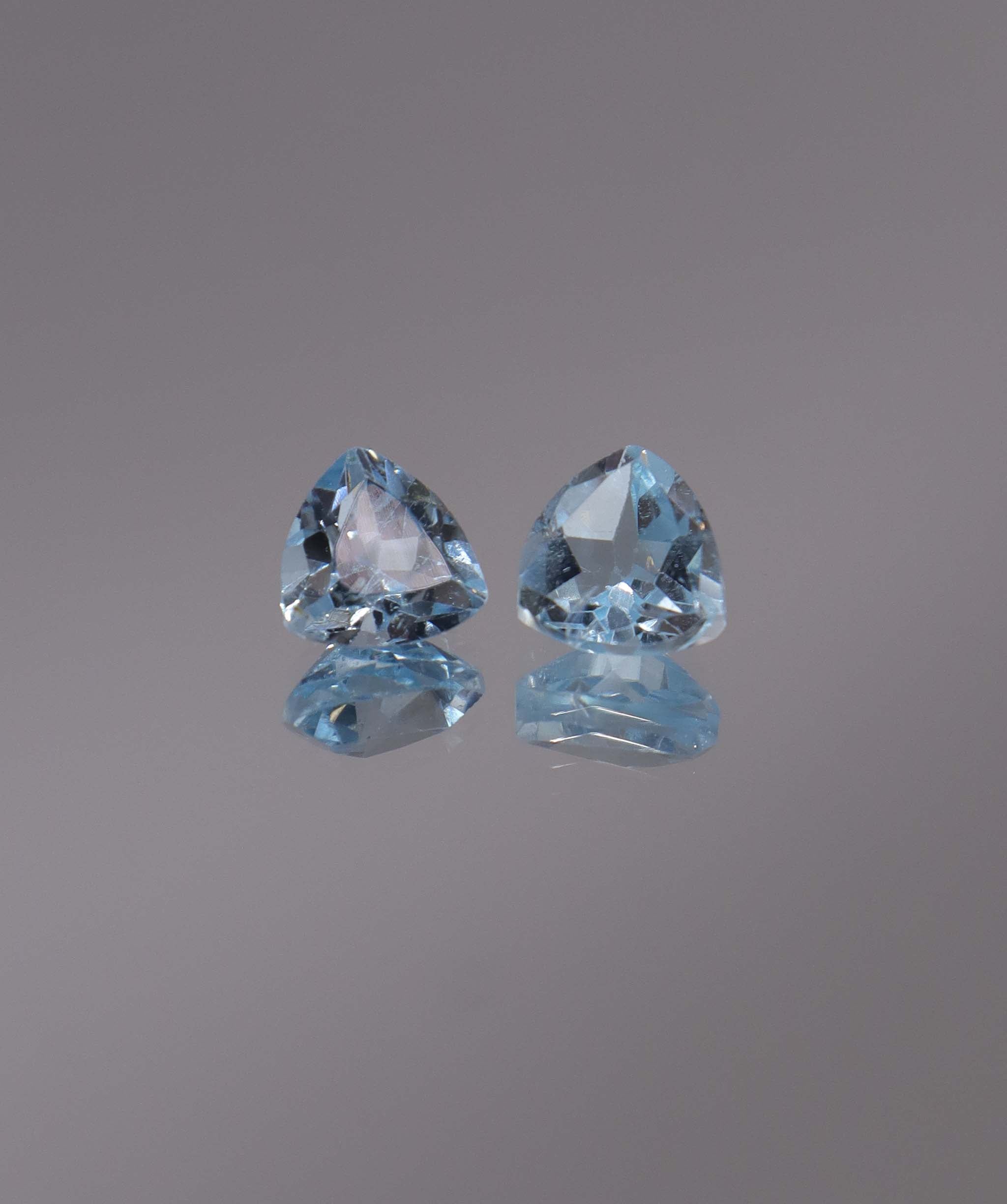 Luxury Promise 3.06ct Sky Blue Topaz Trillion pair DXBCS1212