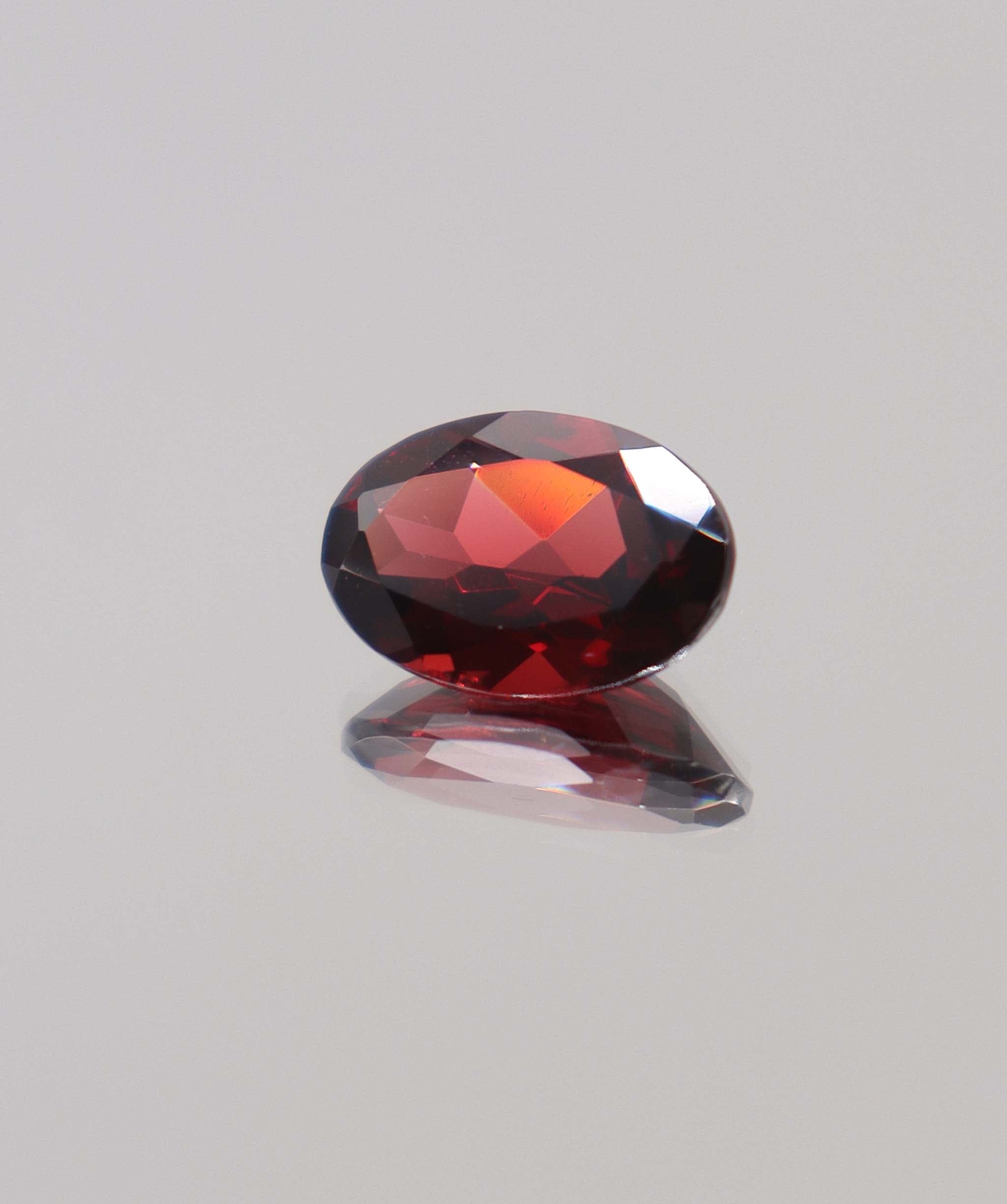 Luxury Promise 6.35ct Almandine Oval DXBCS0402