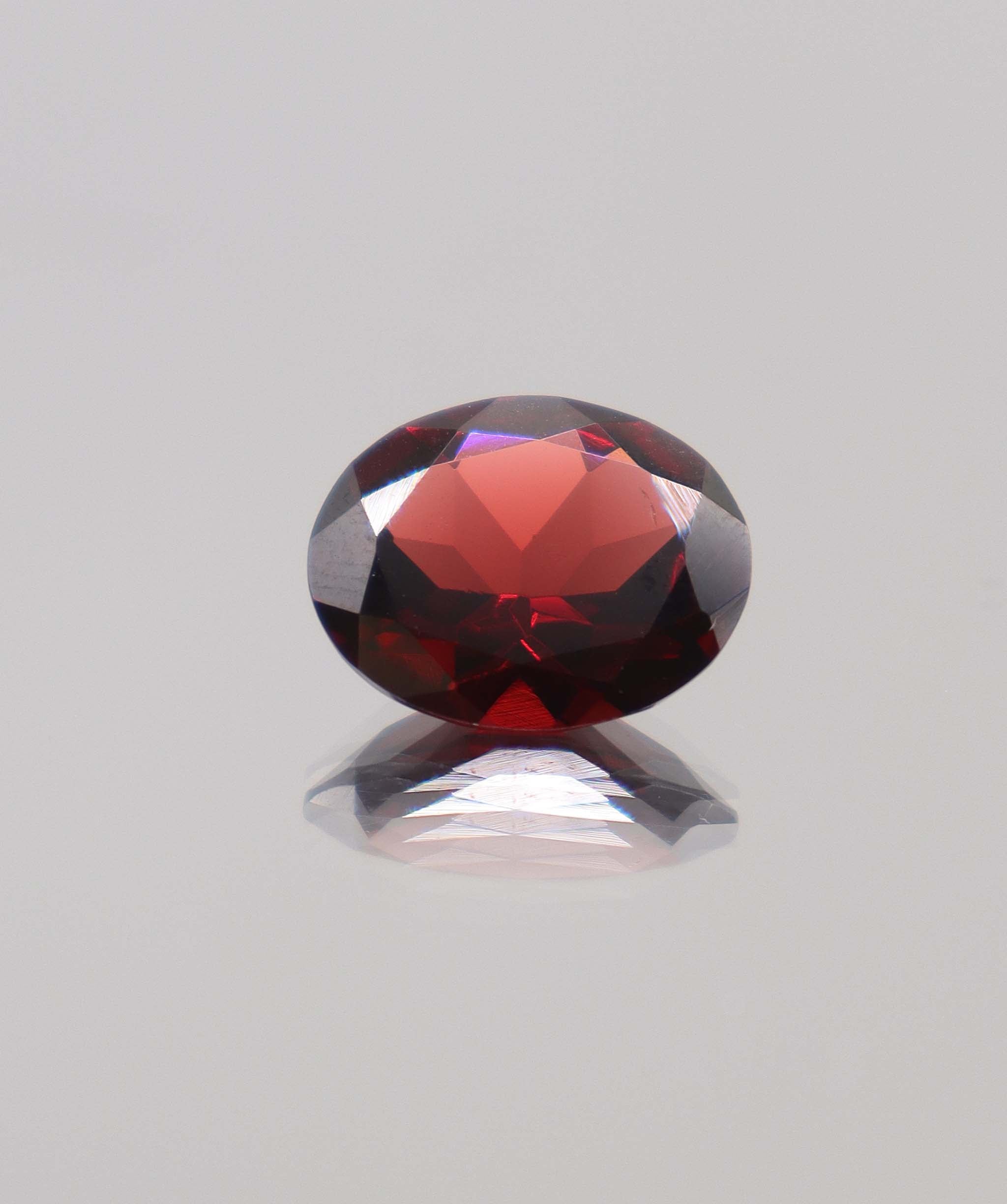 Luxury Promise 6.90ct Almandine Oval DXBCS0400