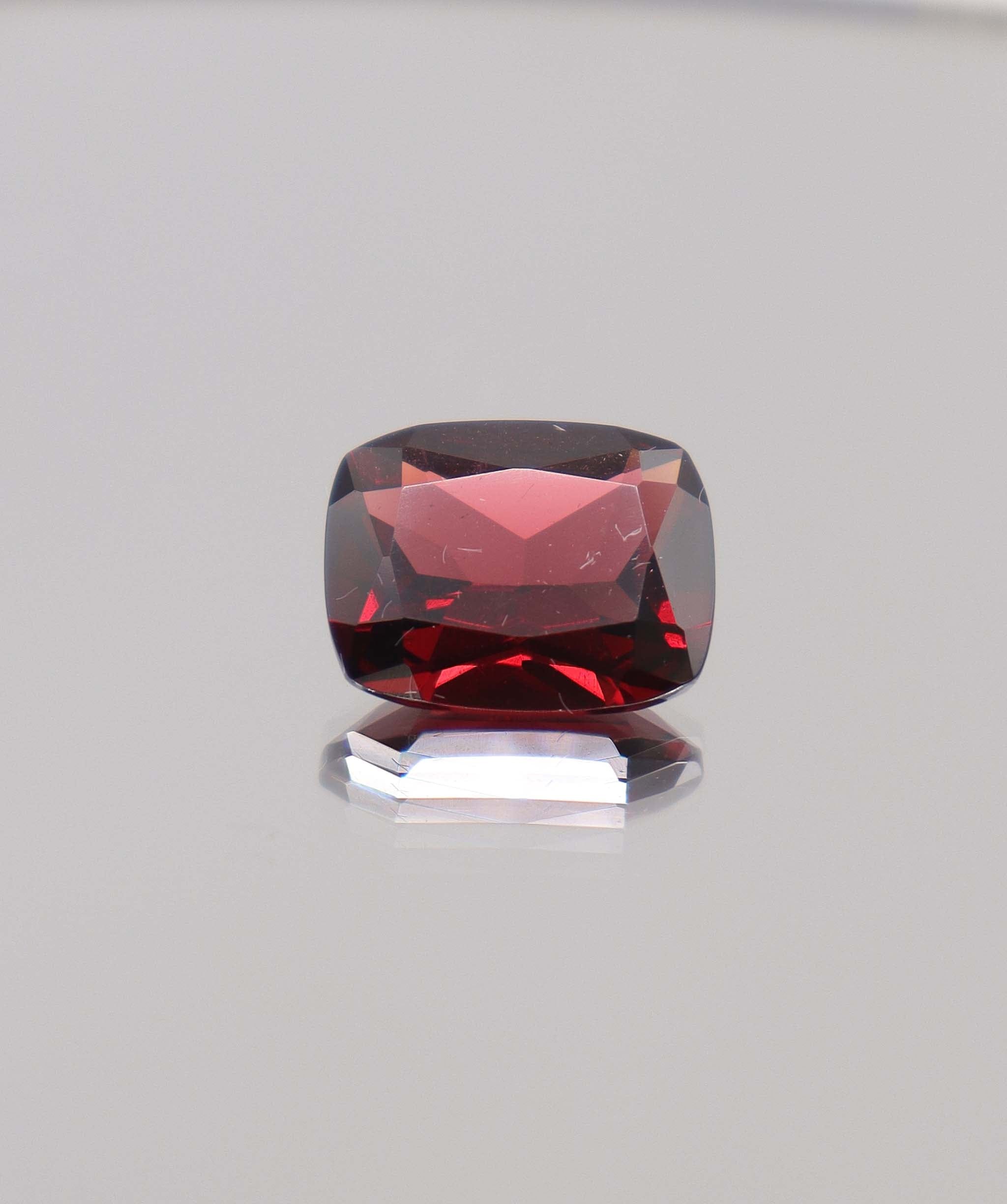 Luxury Promise 7.45ct Almandine Cushion DXBCS0395