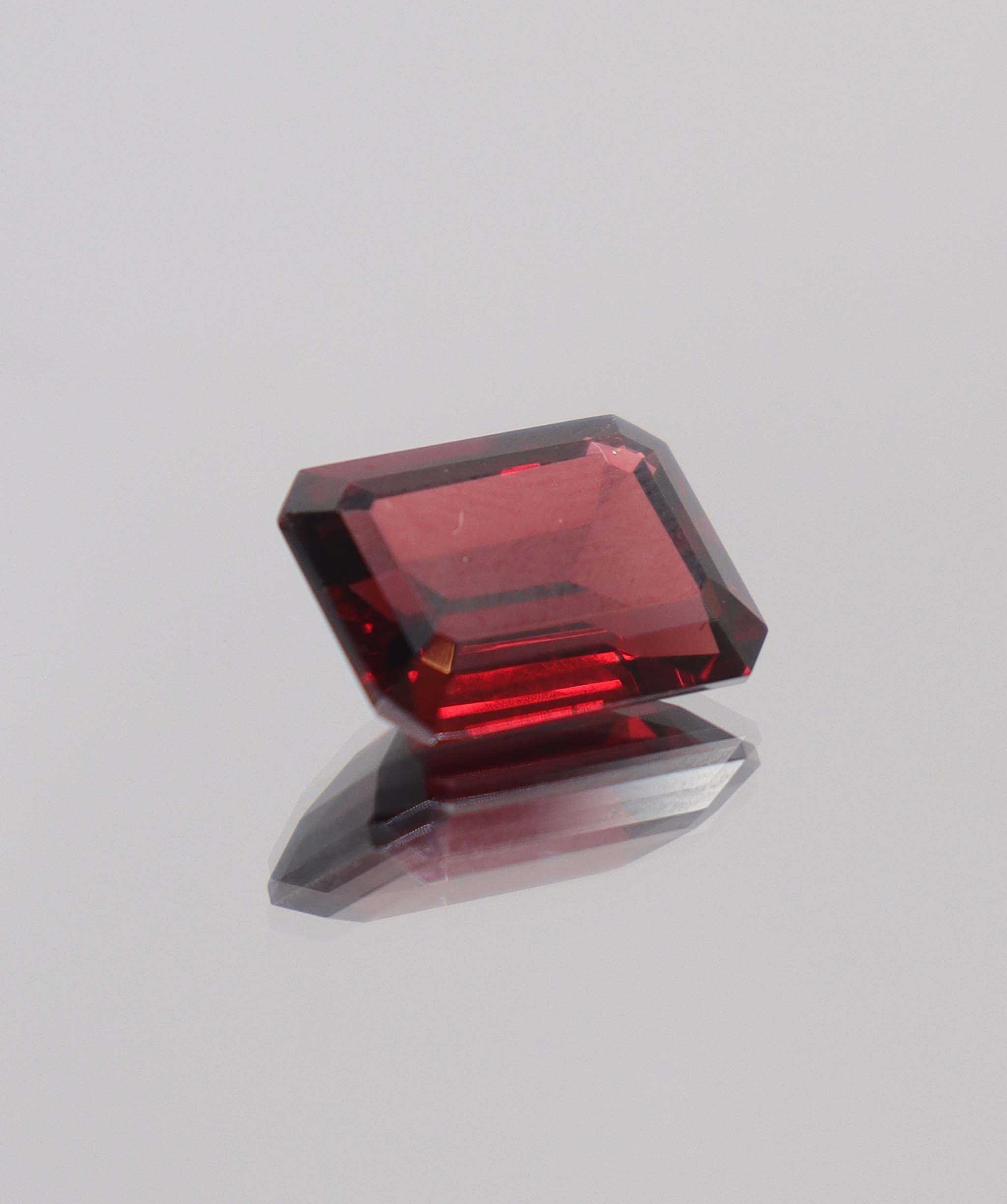 Luxury Promise 8.22ct Almandine Emerald cut DXBCS0406