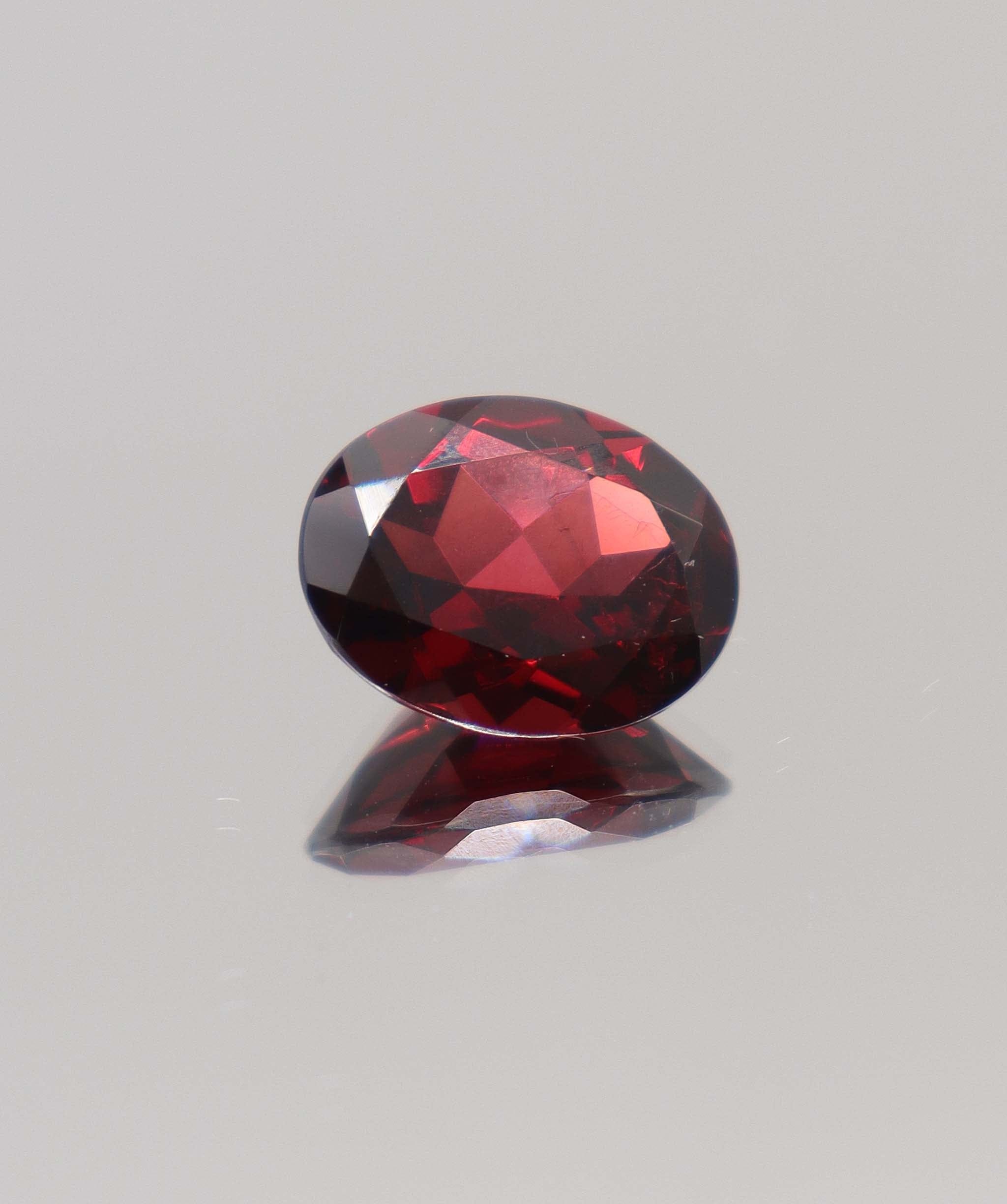Luxury Promise 8.42ct Almandine Oval DXBCS0399