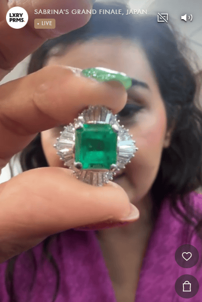 Luxury Promise PT900 4 prong ring with a Natural Colombian Vivid Green Emerald and Baguette Diamond Sunburst Halo L1086