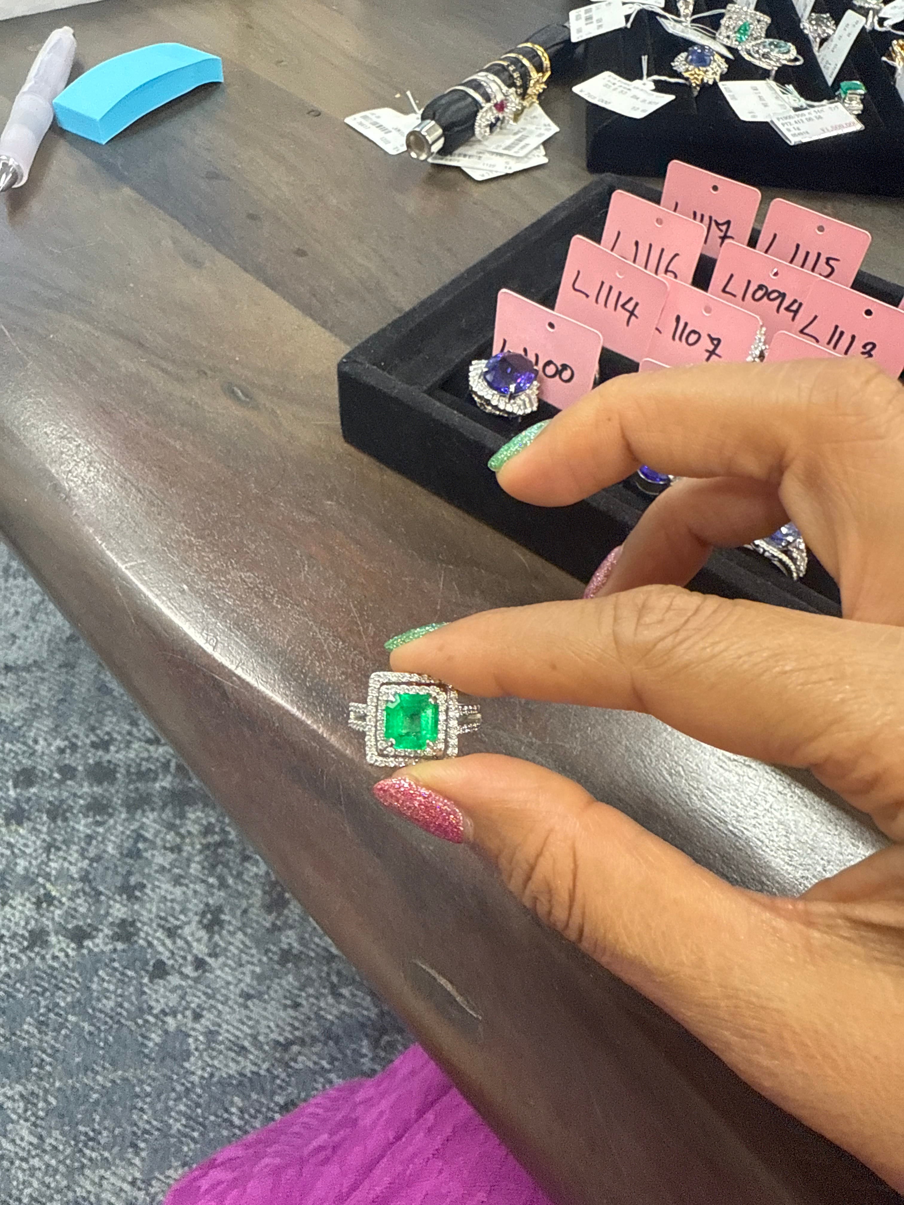 Luxury Promise PT900 4 prong ring with a Natural Colombian Vivid Green Emerald and Baguette/Round Diamond Ballerina Halo L1091