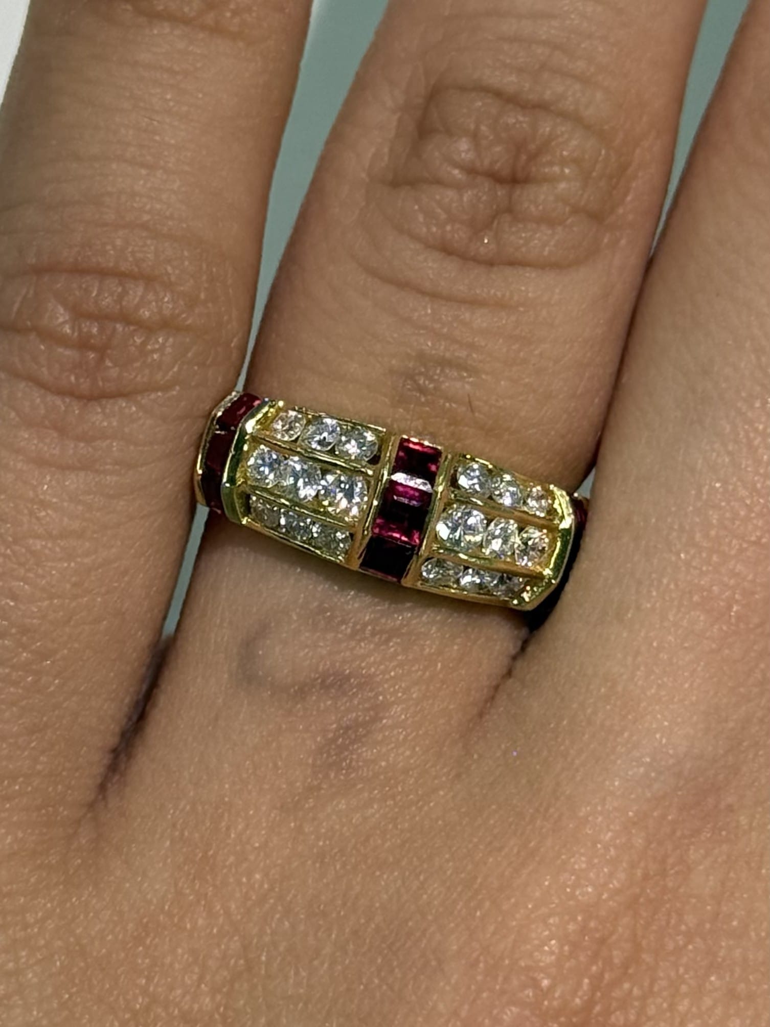 Luxury Promise Ruby and Diamond Band with Channel-Set Rubies and Pavé Diamonds in 18K / 4.80g, R0.62ct, D0.56ct / Size 5.5 US 024227 JJC0021