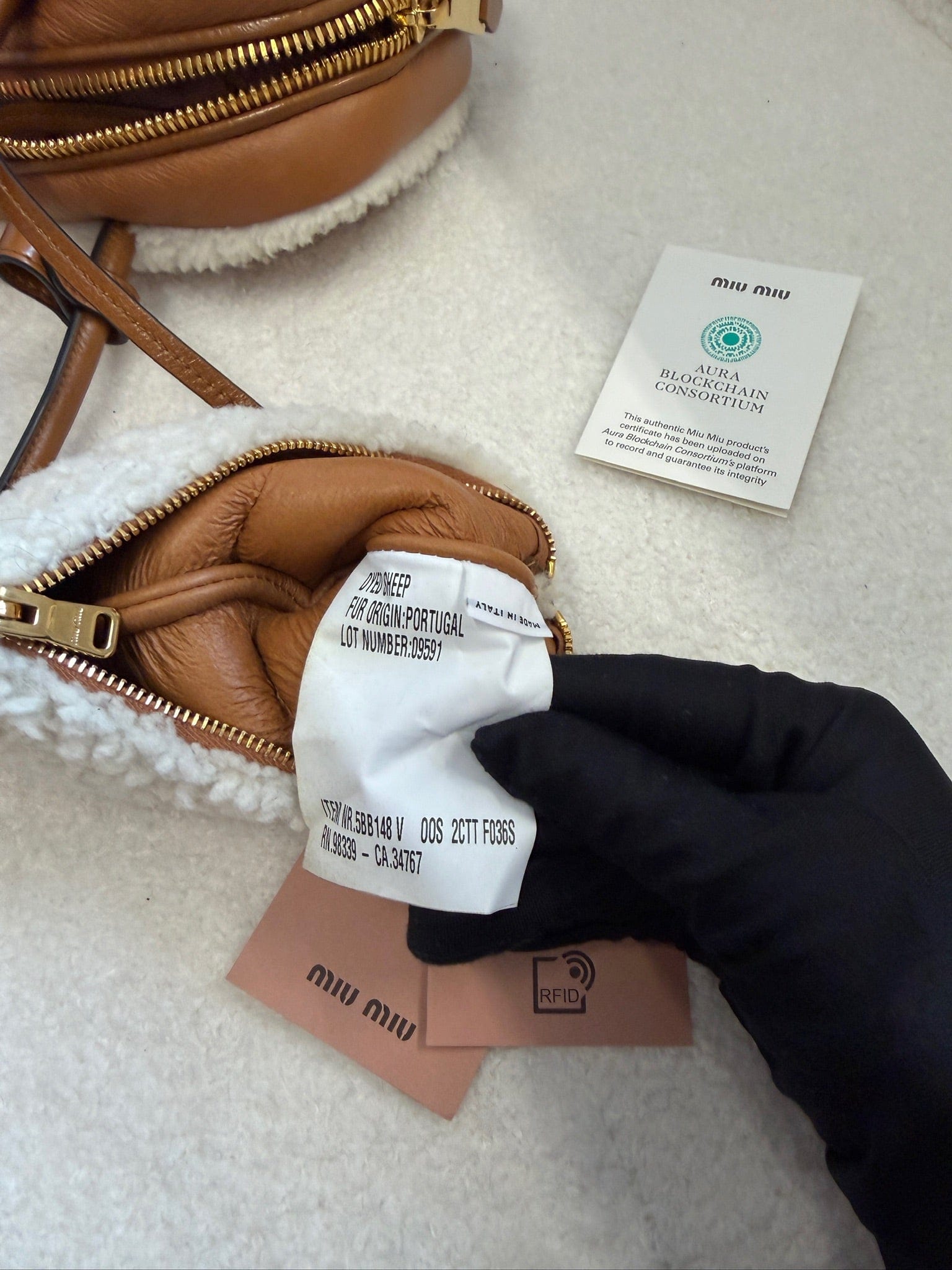 Luxury Promise MIU MIU Beau small shearling bag
