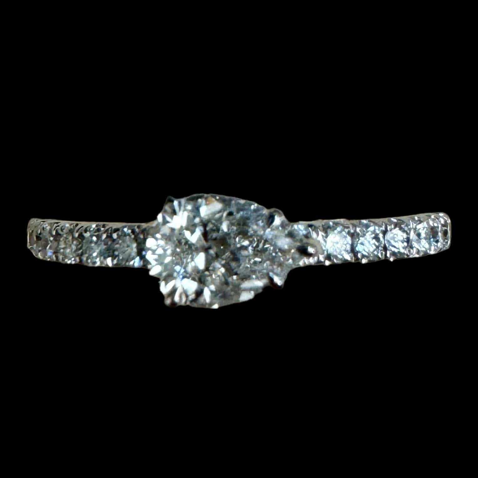 Luxury Promise GIA Pear Centre Diamond with Further Diamonds on the Band