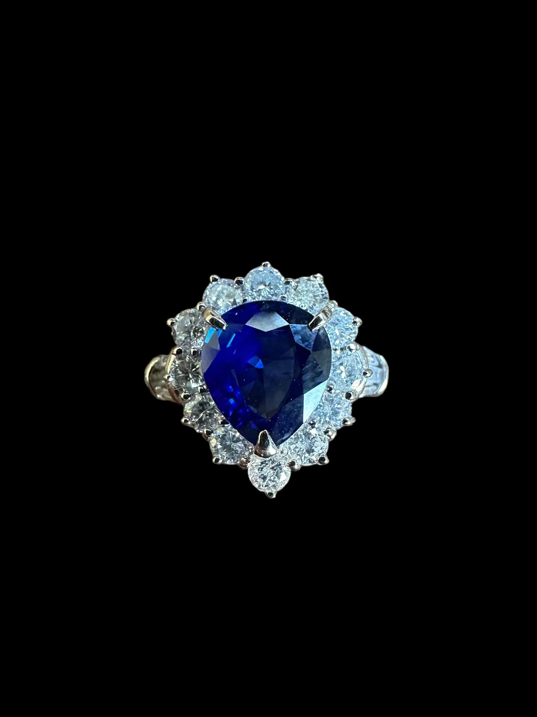 Luxury Promise Pear "Royal Blue" Sapphire & Diamond Ring set in Platinum