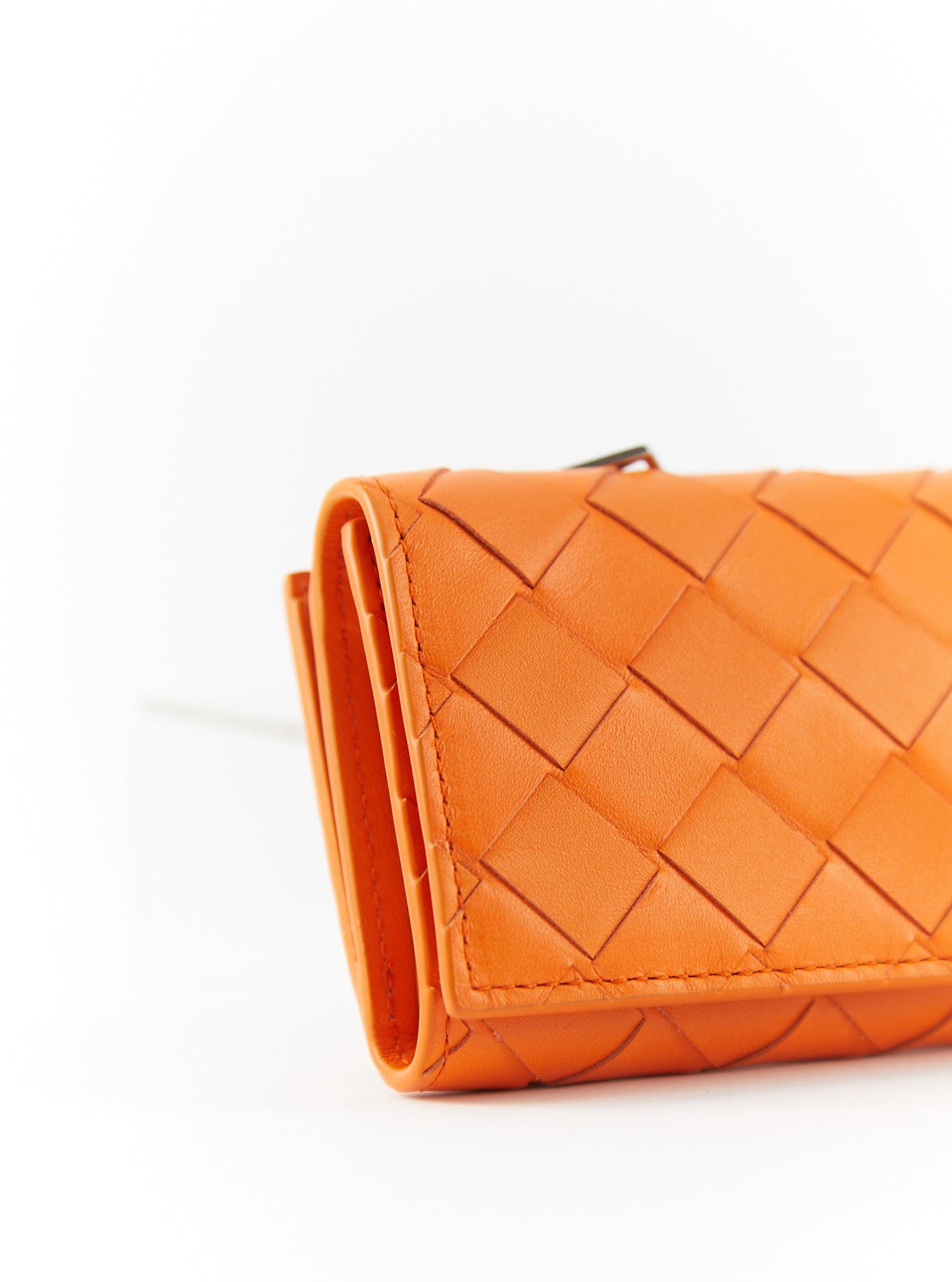 LuxuryVault BOTTEGA VENETA Tiny Intrecciato Tri-Fold Zip Wallet in Orange