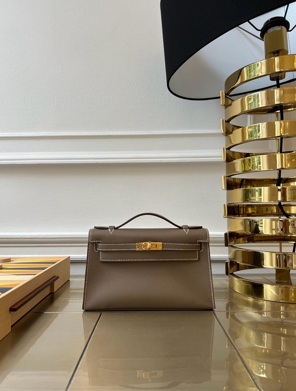 LuxuryVault HERMÈS KELLY POCHETTE ETOUPE Swift Leather with Gold Hardware
