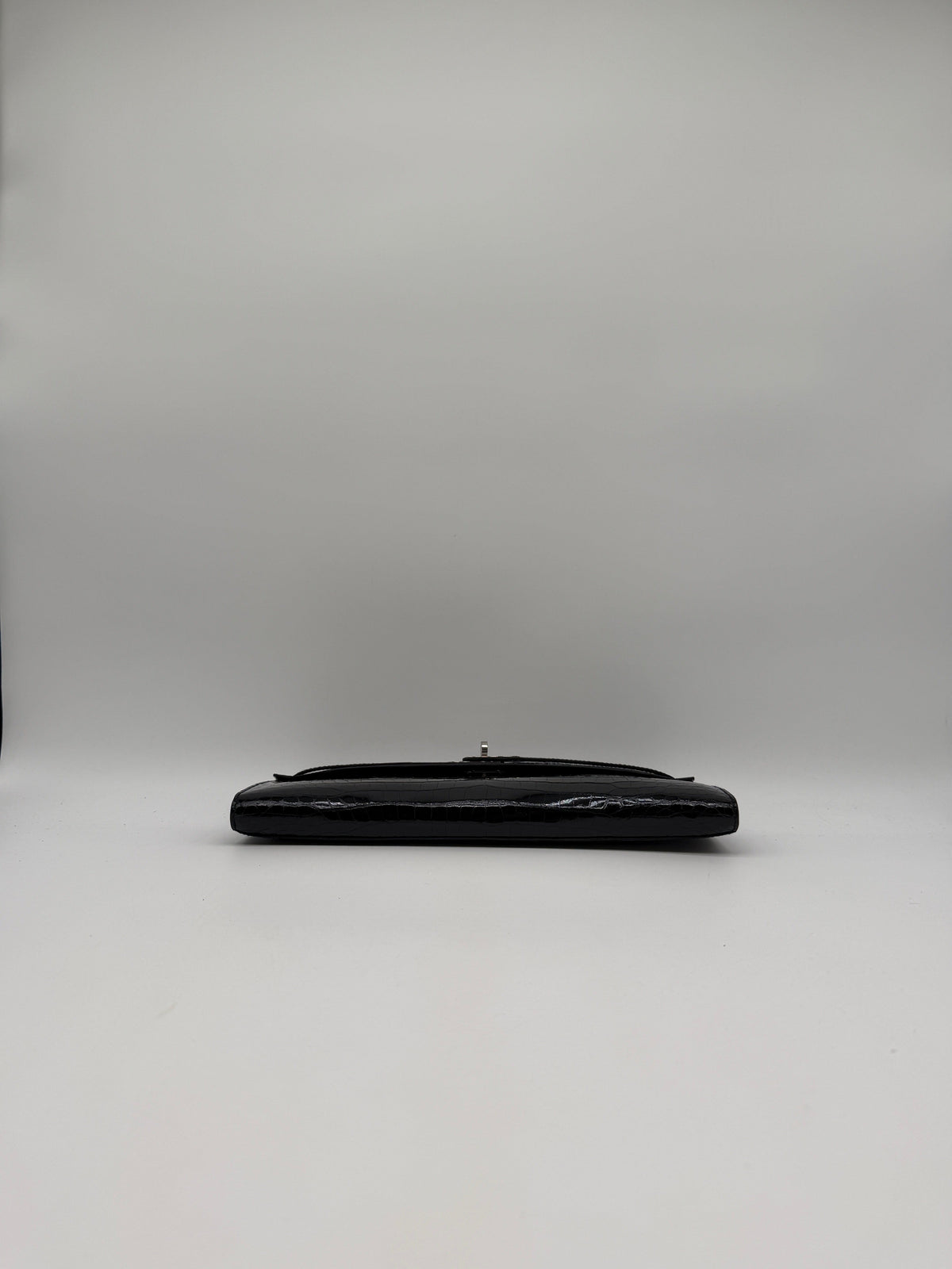 Prime Concierge Hermès Kelly Cut Black Shiny Porosus Palladium Hardware