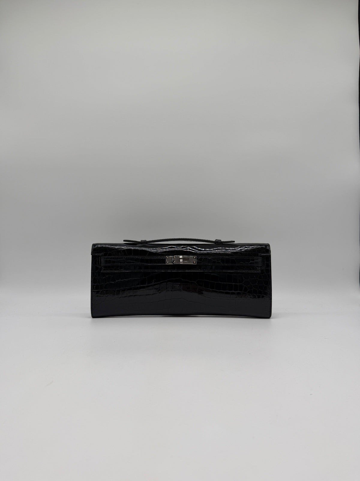 Prime Concierge Hermès Kelly Cut Black Shiny Porosus Palladium Hardware