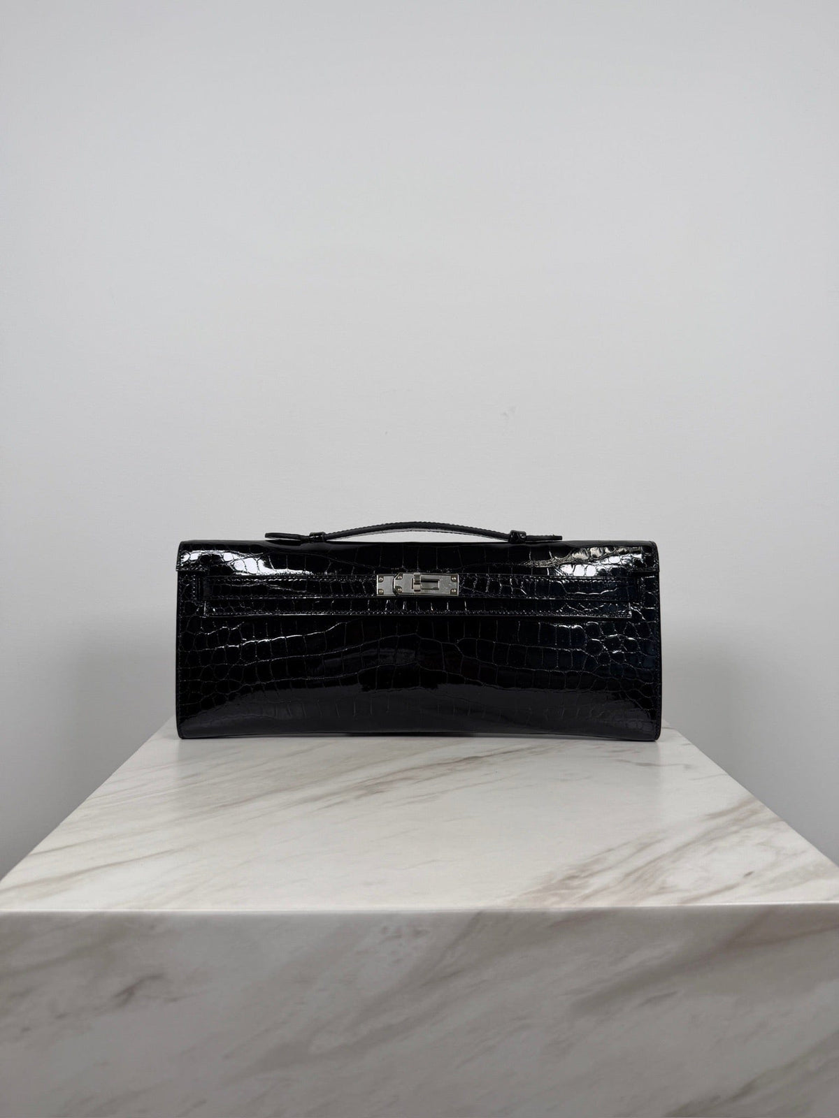 Prime Concierge Hermès Kelly Cut Black Shiny Porosus Palladium Hardware