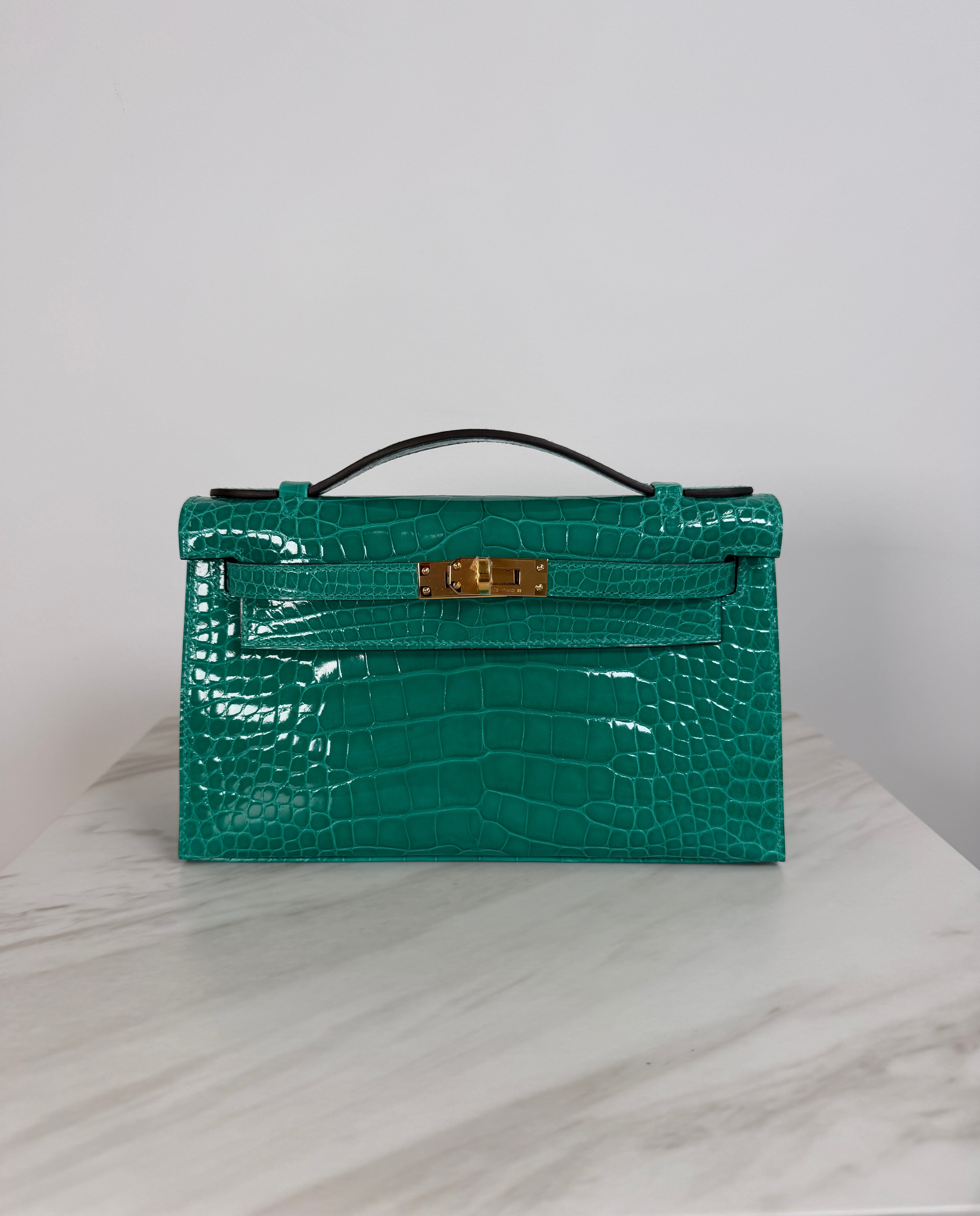 Prime Concierge Hermès Kelly Pochette Vert Jade Shiny Alligator Gold Hardware