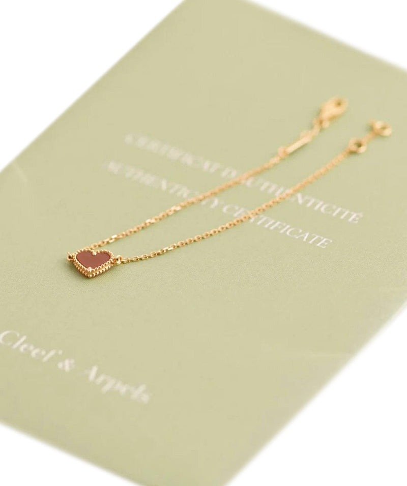Van Cleef & Arpels Sweet Alhambra Heart Carnelian Rose Gold Bracelet A –  LuxuryPromise