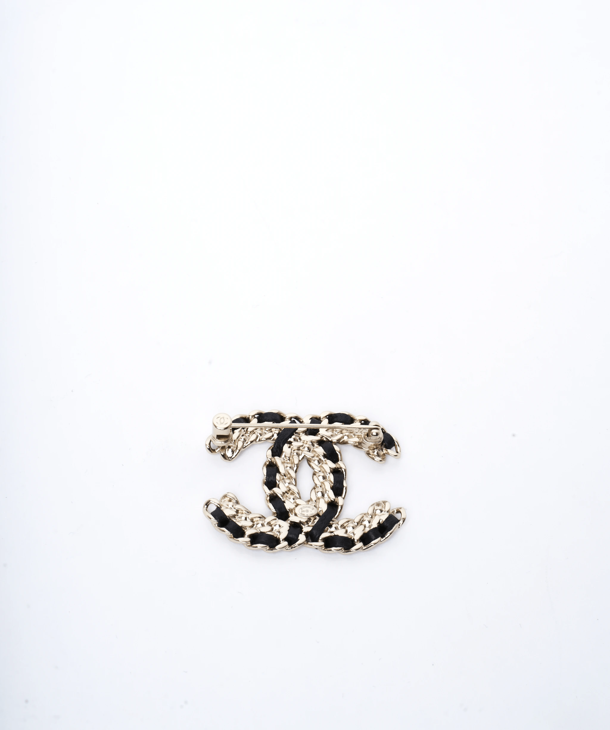 Chanel Chanel black and gold crystal interwoven brooch