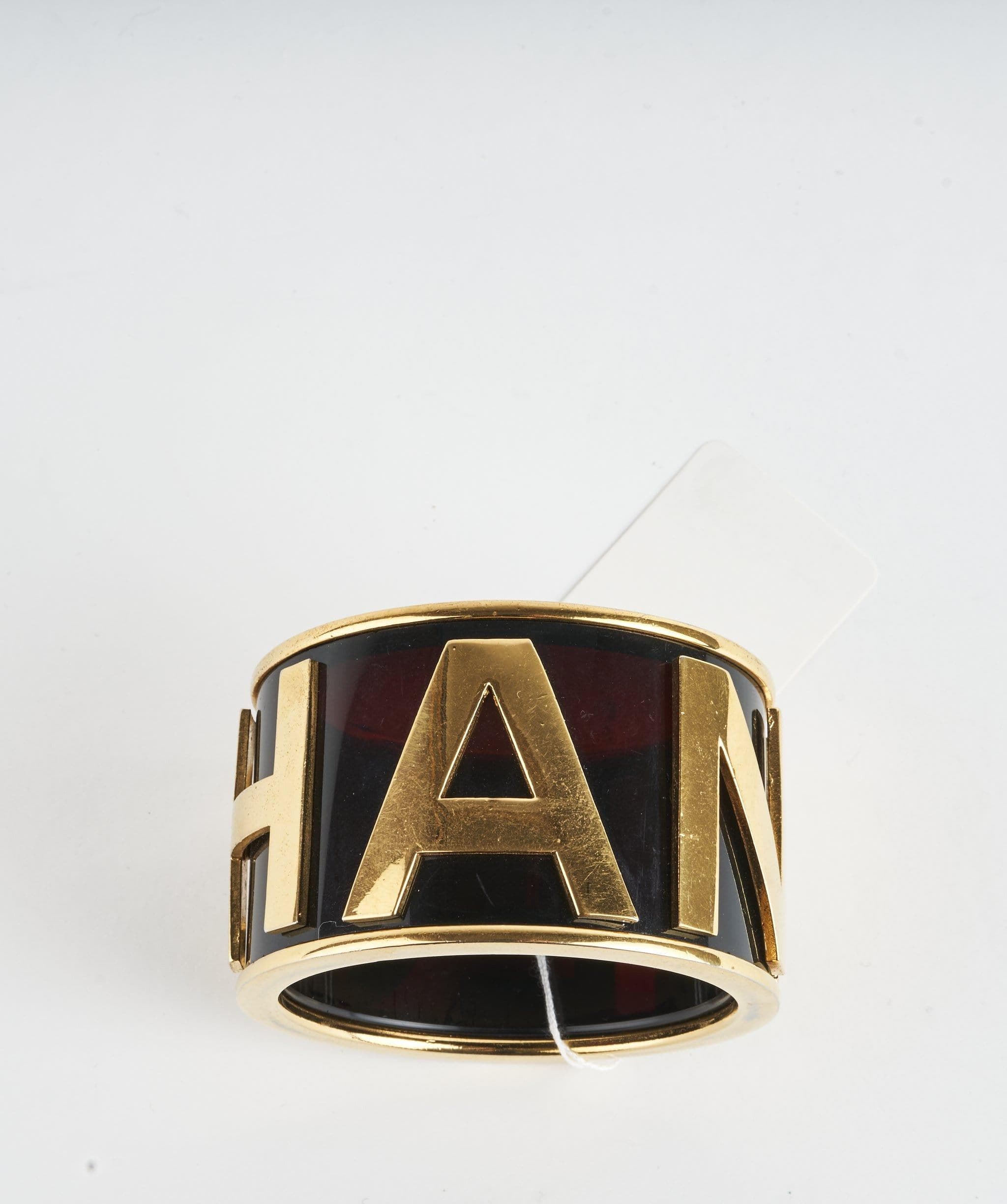 Chanel Chanel Black Gold Initial Bangle