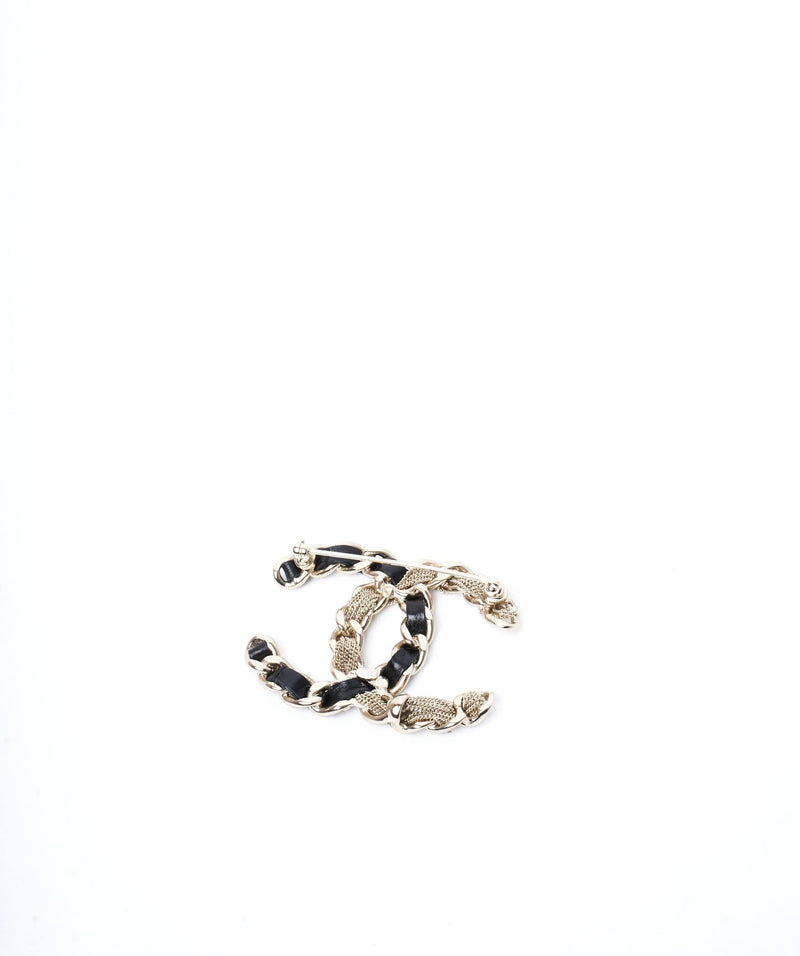 Chanel Chanel CC black and beige rope chain brooch
