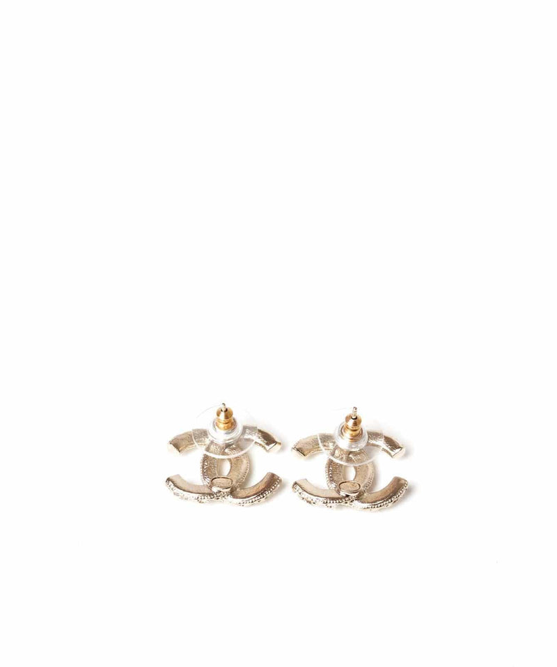 Chanel Chanel cystal and gold criss cross patterned earrings