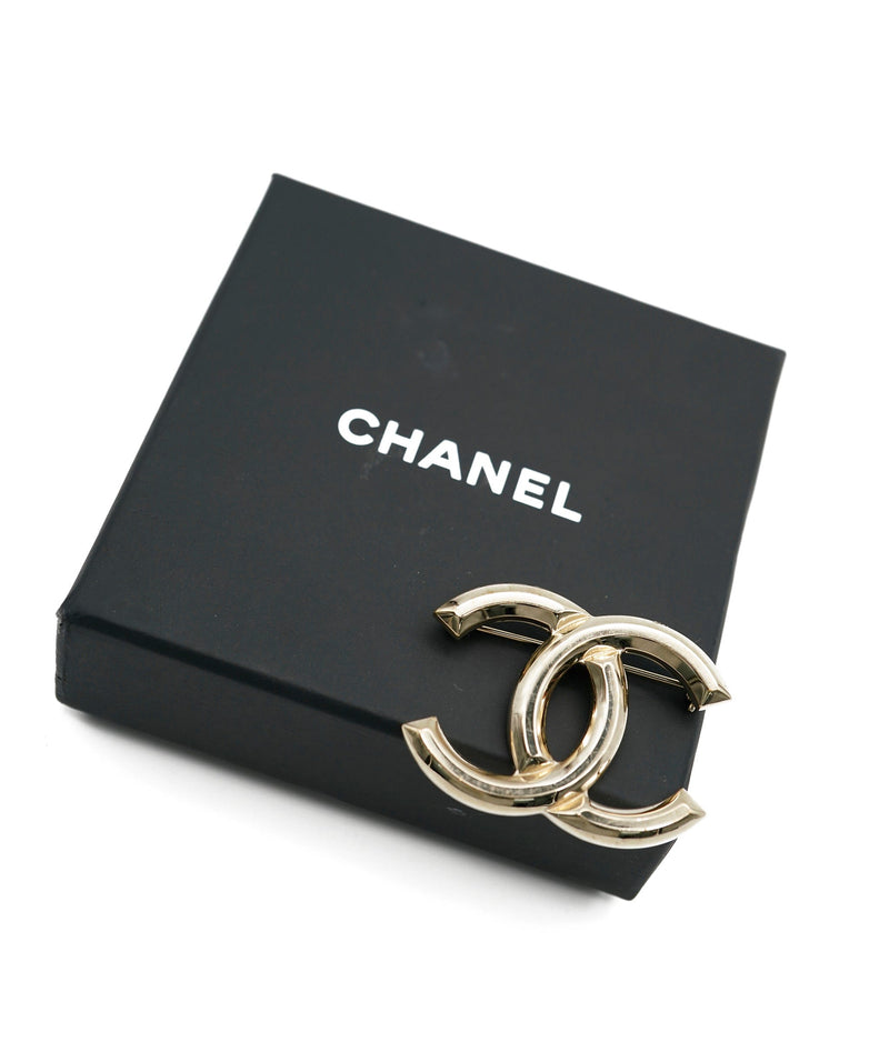 Chanel Gold Metal Imitation Pearl Black Rhinestone CC Logo Brooch 2022  Available For Immediate Sale At Sothebys