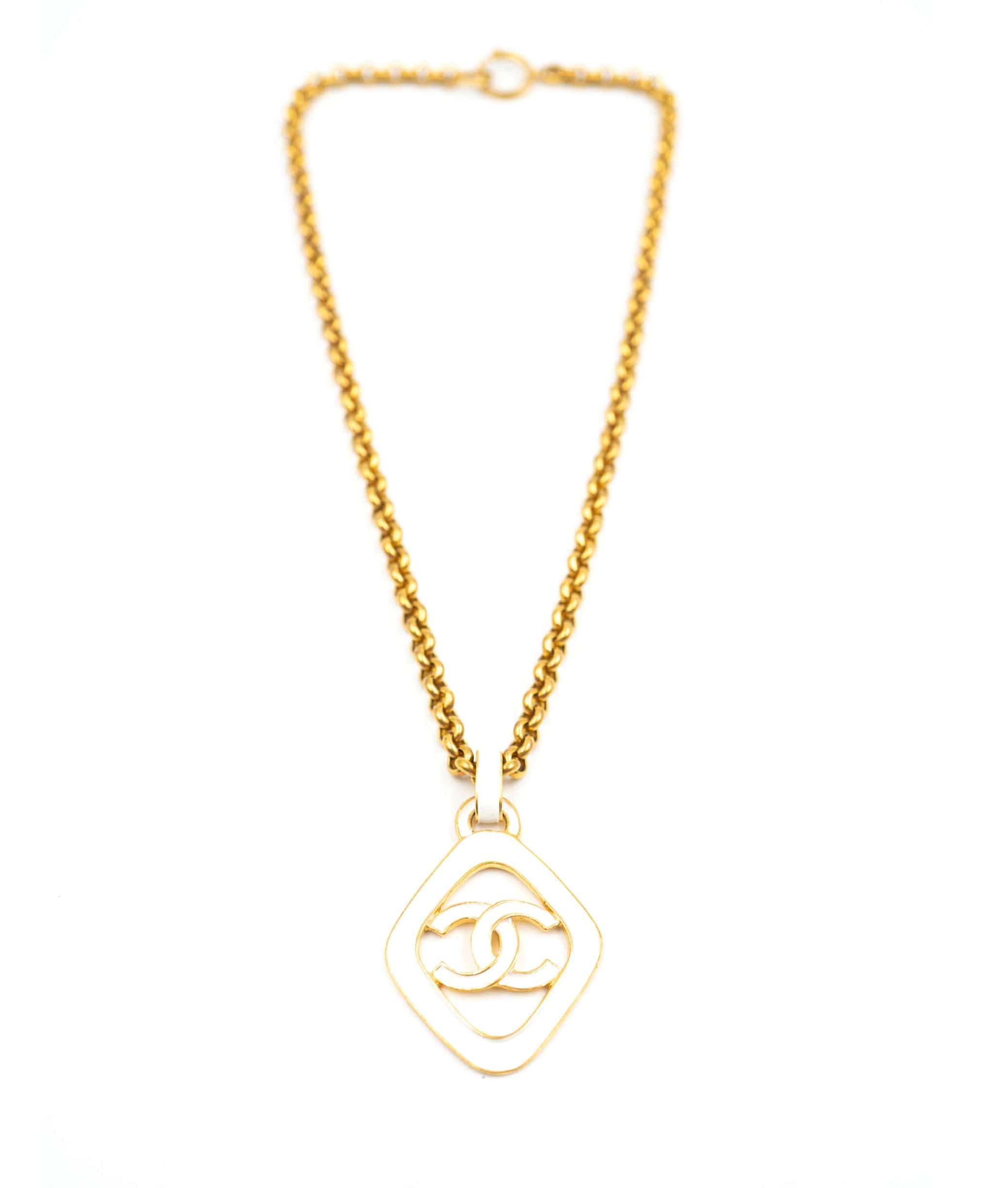 Vintage Chanel chain necklace with white enamel CC logo pendant, from –  LuxuryPromise