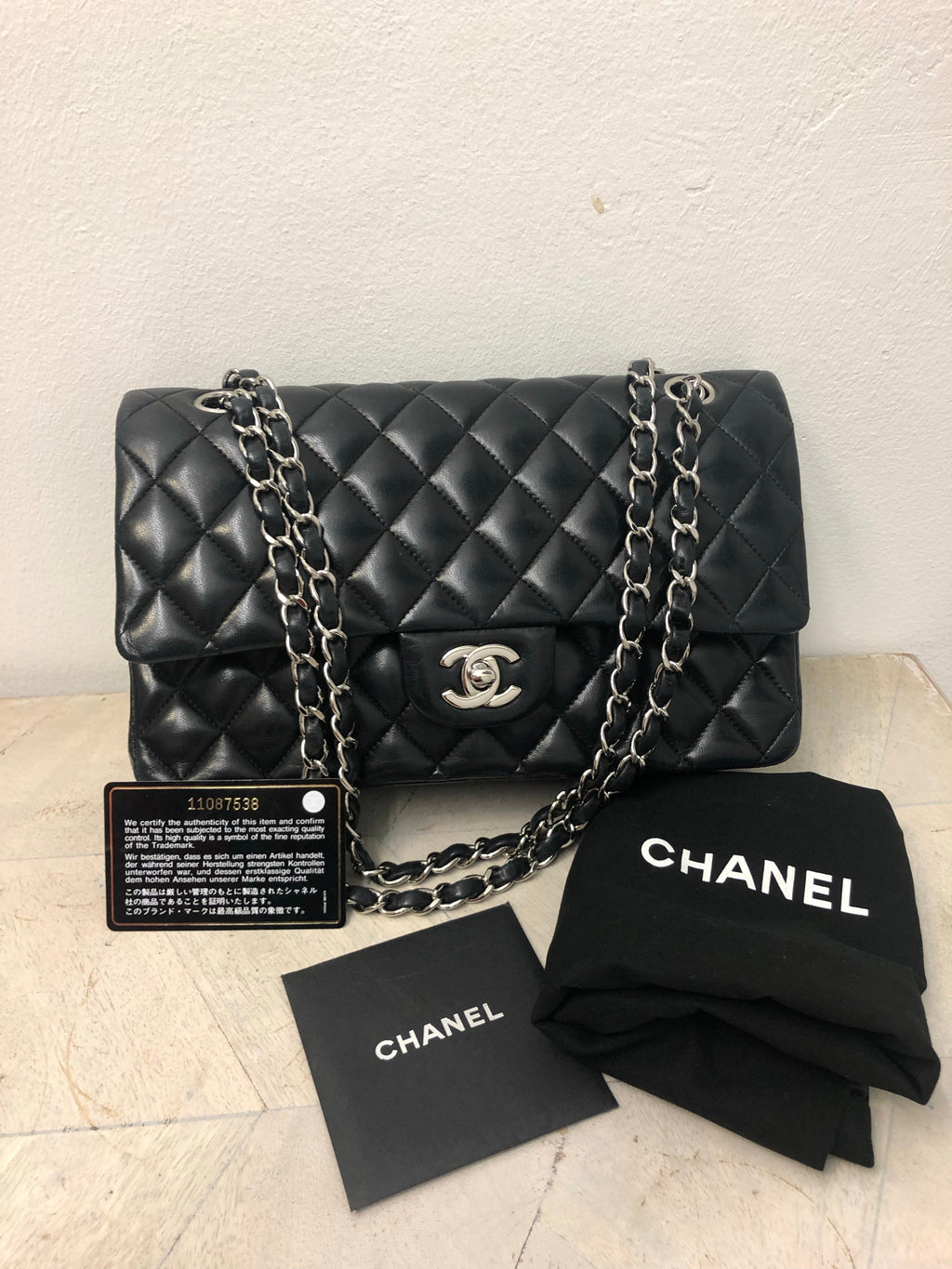 chanel black purse with silver chain
