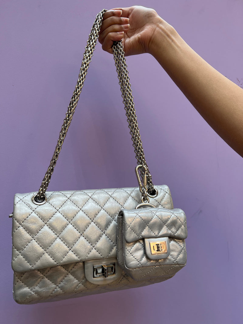 Chanel 2.55 reissue silver bag with matching mini pouch - AWL3339 –  LuxuryPromise
