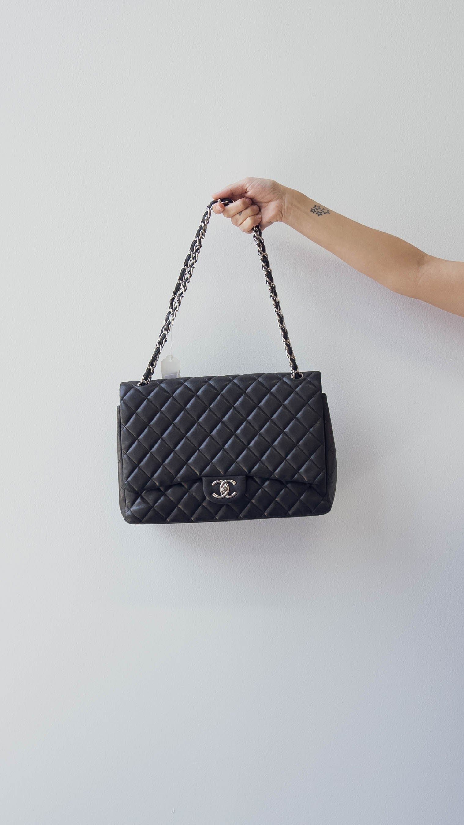 Chanel Black Lambskin Leather Maxi Double Classic Flap Bag PHW - AGL18 –  LuxuryPromise