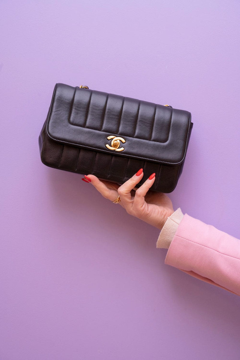 Chanel Black Lambskin Vertical Quilted Single Flap Bag - ASL2174 –  LuxuryPromise