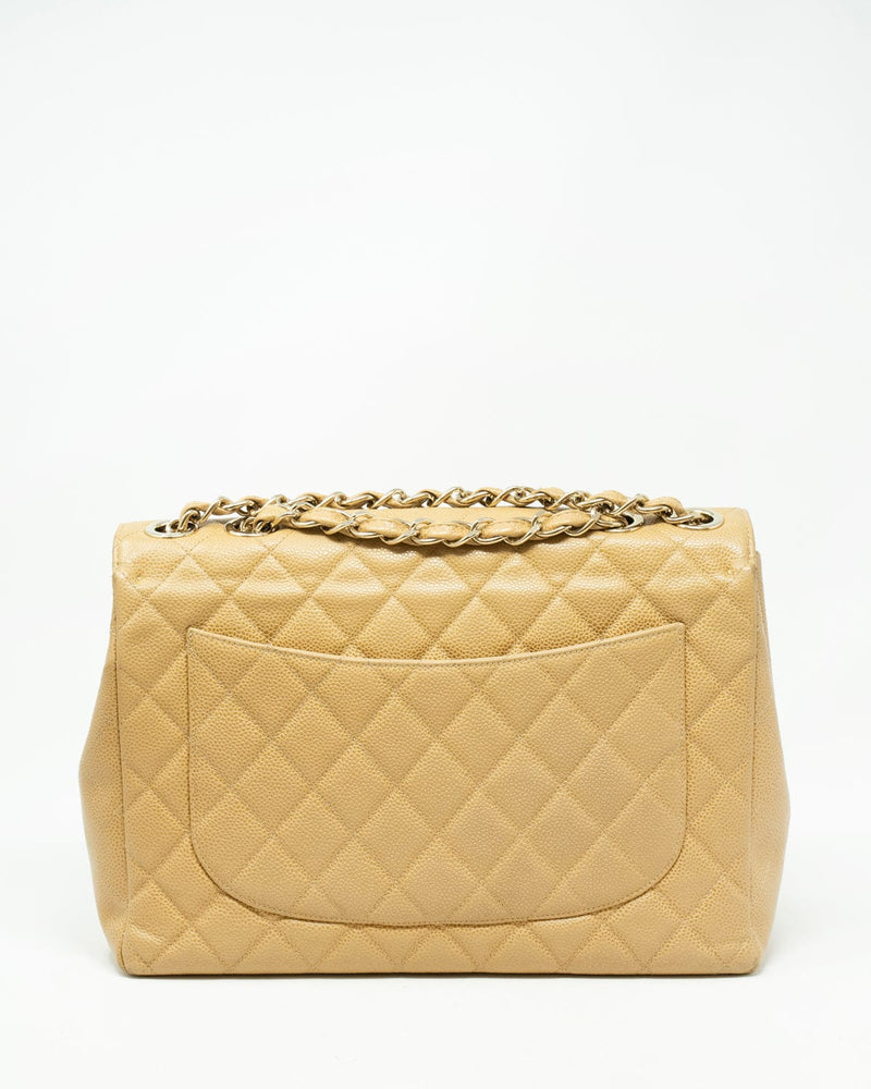 Chanel Vintage Beige Quilted Caviar Leather Shoulder Flap Bag Large CC –  Reeluxs Luxury