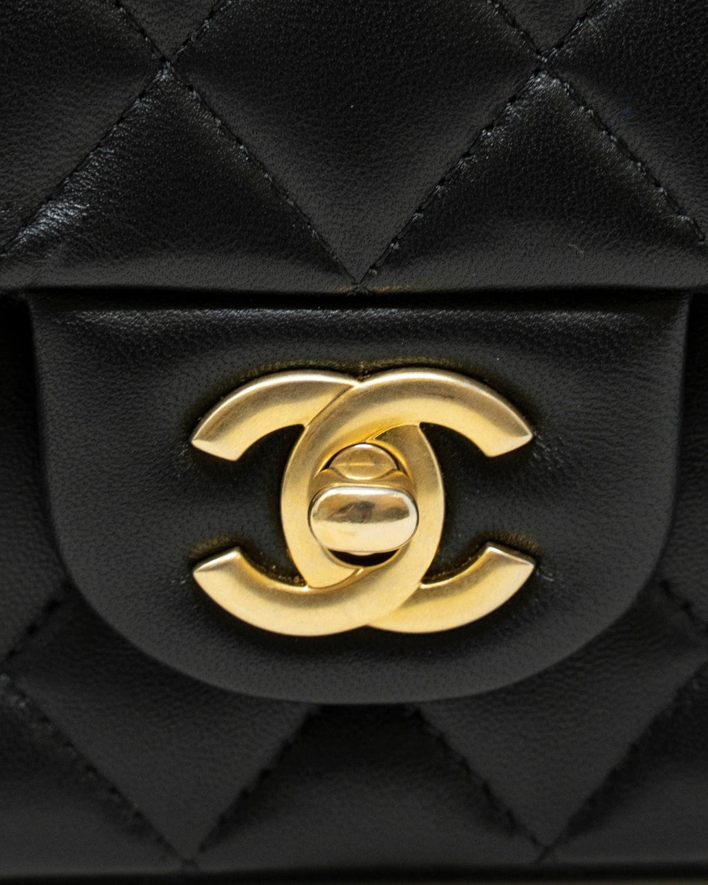 Chanel mini coco top handle in black lambskin with champagne gold hard –  LuxuryPromise